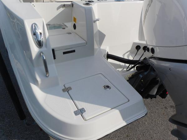 2025 Sailfish 232 CC boat deck and engine detail.