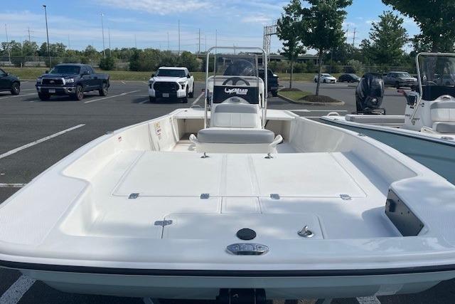 2026 Mako Pro Skiff 17 CC boat in parking lot, front view.
