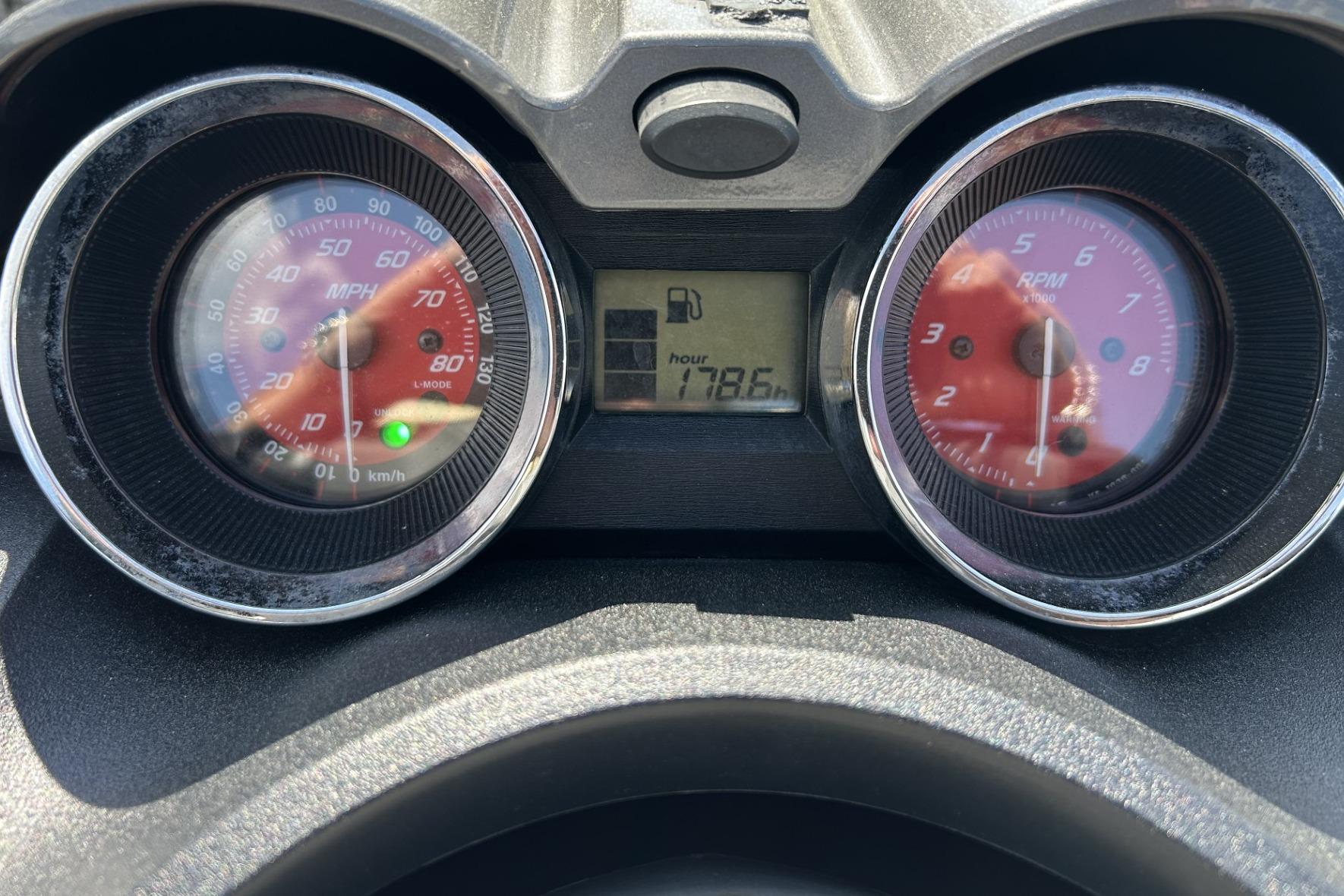 Dashboard of a 2011 Yamaha WaveRunner FZS showing speedometer and RPM gauges.