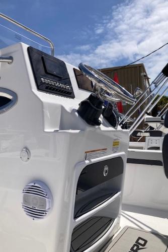 2025 Sea Pro 202 Center Console boat dashboard with steering wheel and controls.