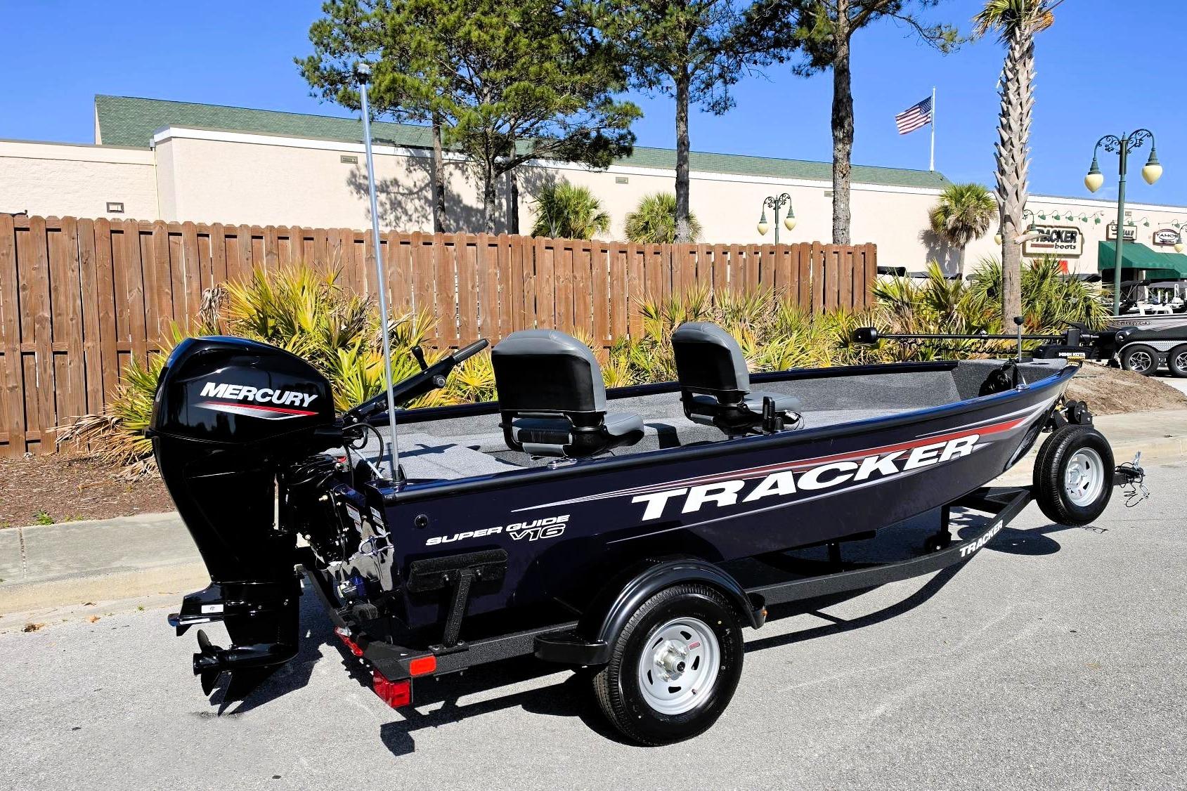 2026 Tracker Super Guide V-16 T boat with Mercury engine on trailer.