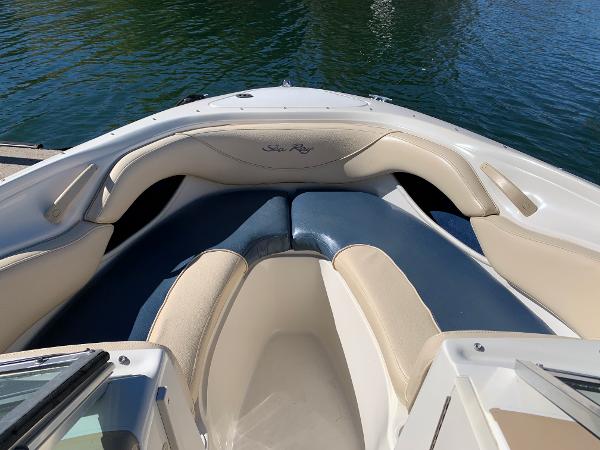 2000 Sea Ray 210 Bow Rider boat interior with cushioned seating.