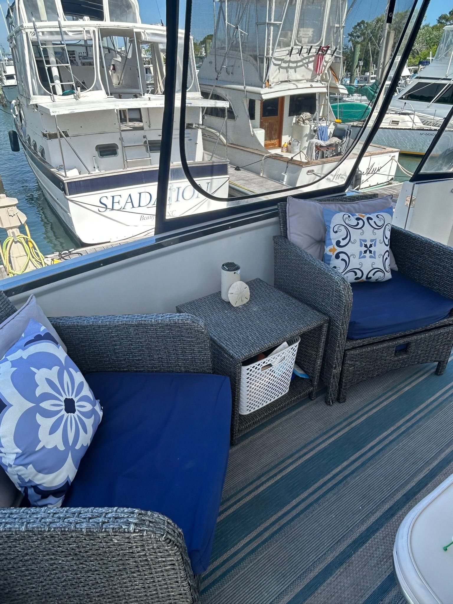 Carver 356 Yacht with cozy seating area in harbor.