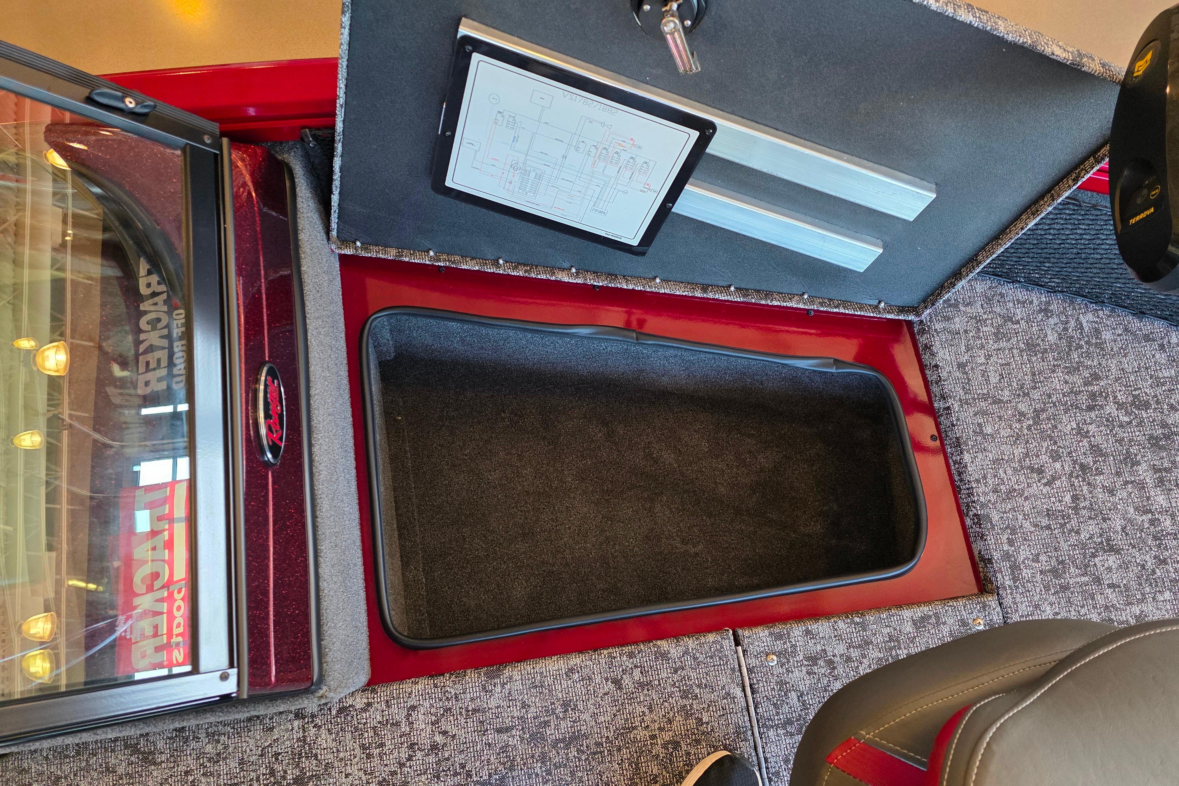 2026 Ranger VS1782SC Reata boat interior storage compartment with open lid and visible wiring diagram.