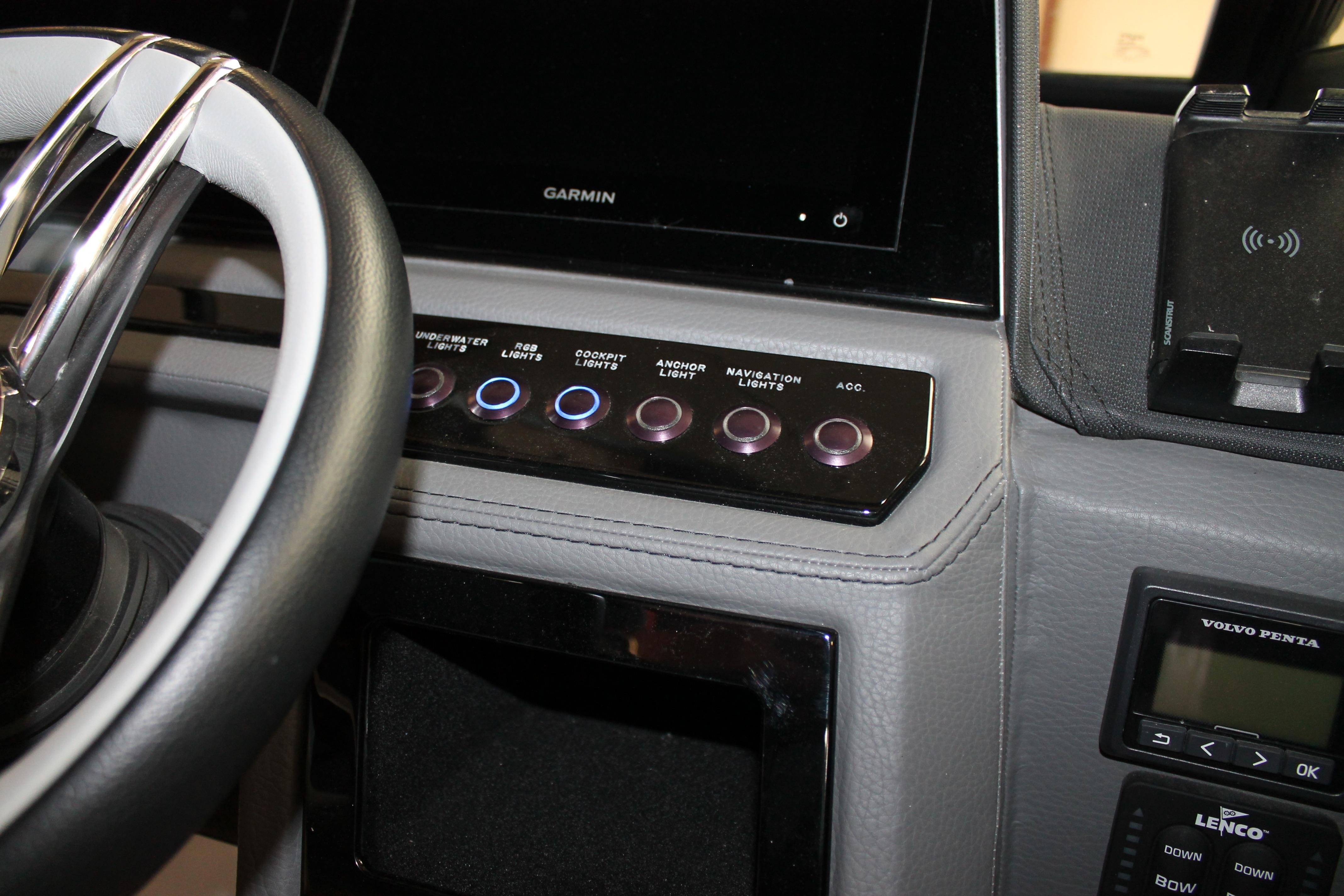 Dashboard of 2023 Cobalt R8 with steering wheel and control panel.