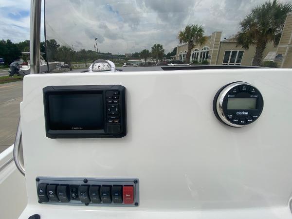 2024 Key West 189 FS boat dashboard with Garmin display and Clarion audio system.