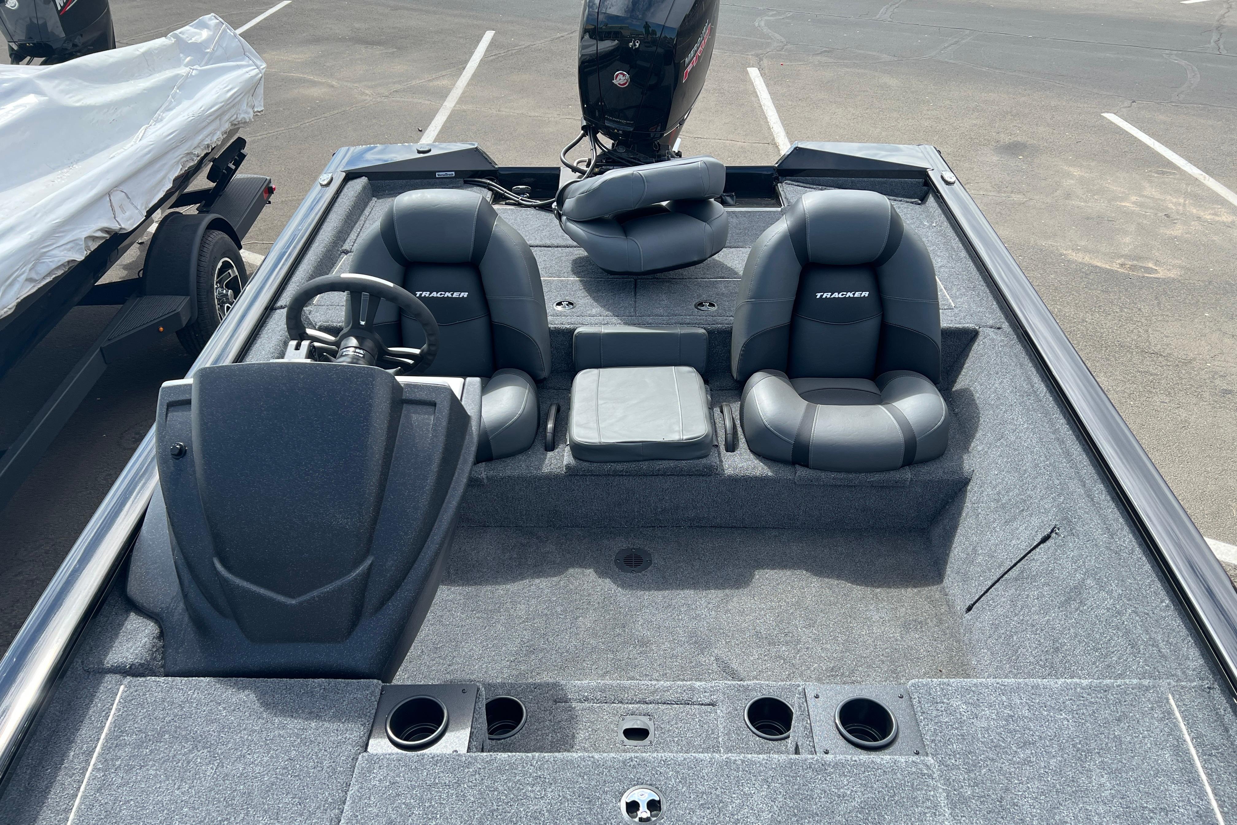 2026 Tracker Pro Team 195 boat interior with dual seats and steering console.