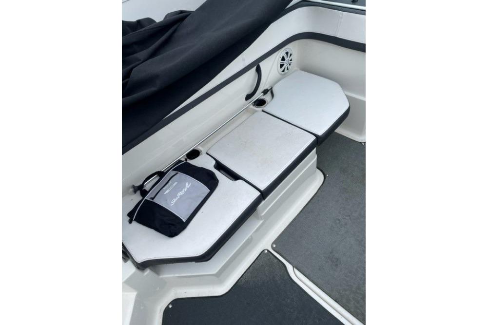 Interior seating of 2015 Sea Ray 210 SLX boat with storage bag.