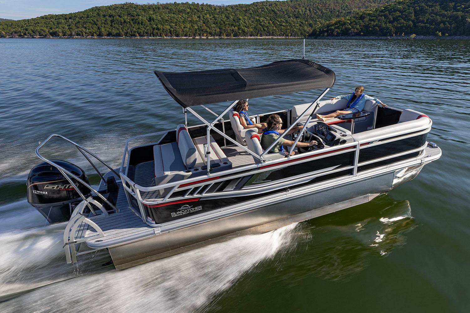 Manufacturer Provided Image: 2026 SunCatcher Select 322SL pontoon boat cruising on a scenic lake.