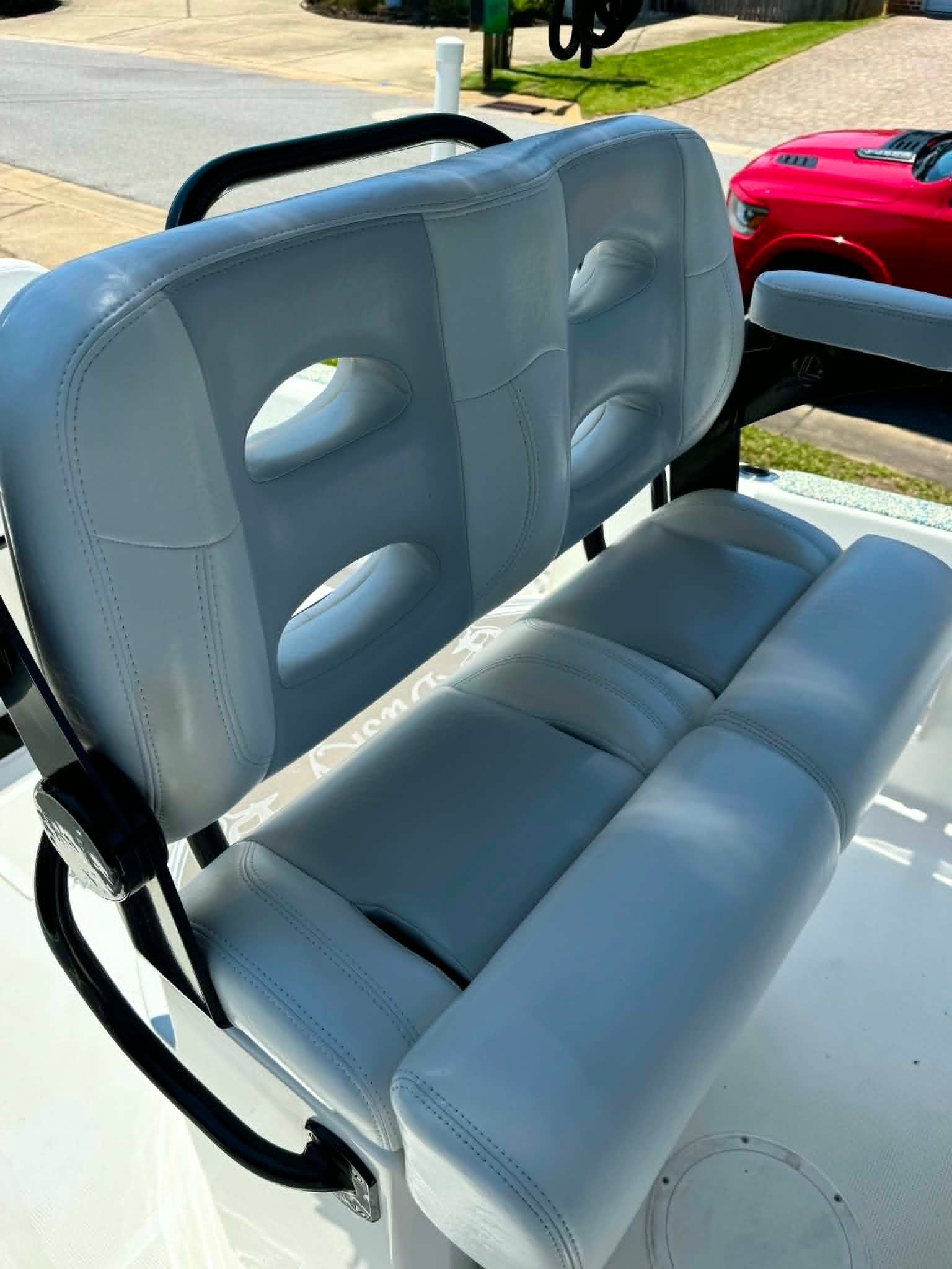 2023 Dusky 278 XFT boat seat with gray upholstery.