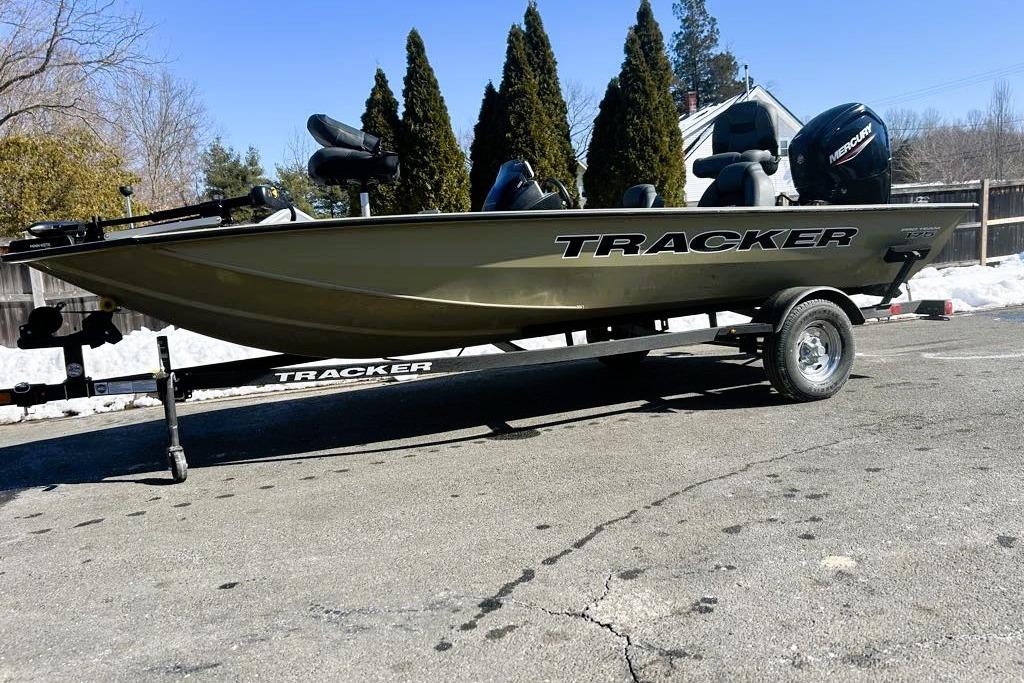 2026 Tracker Pro Team 175 boat on trailer, parked outdoors.