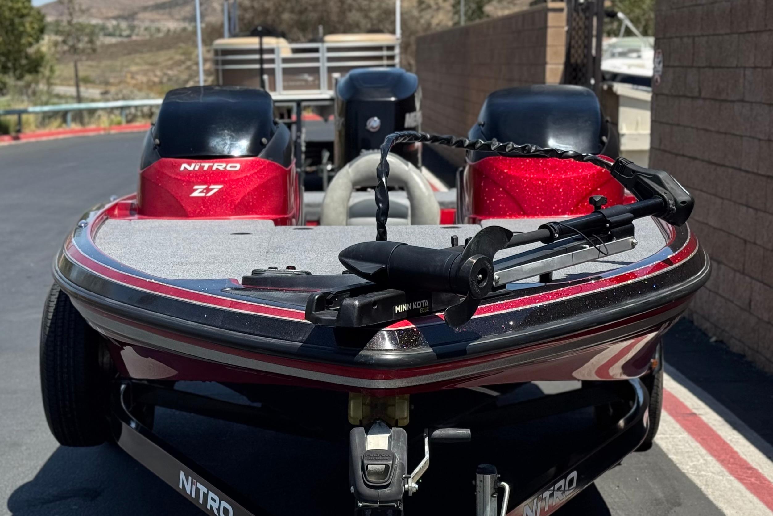 2012 Nitro Z-7 boat with Minn Kota trolling motor, parked outdoors.