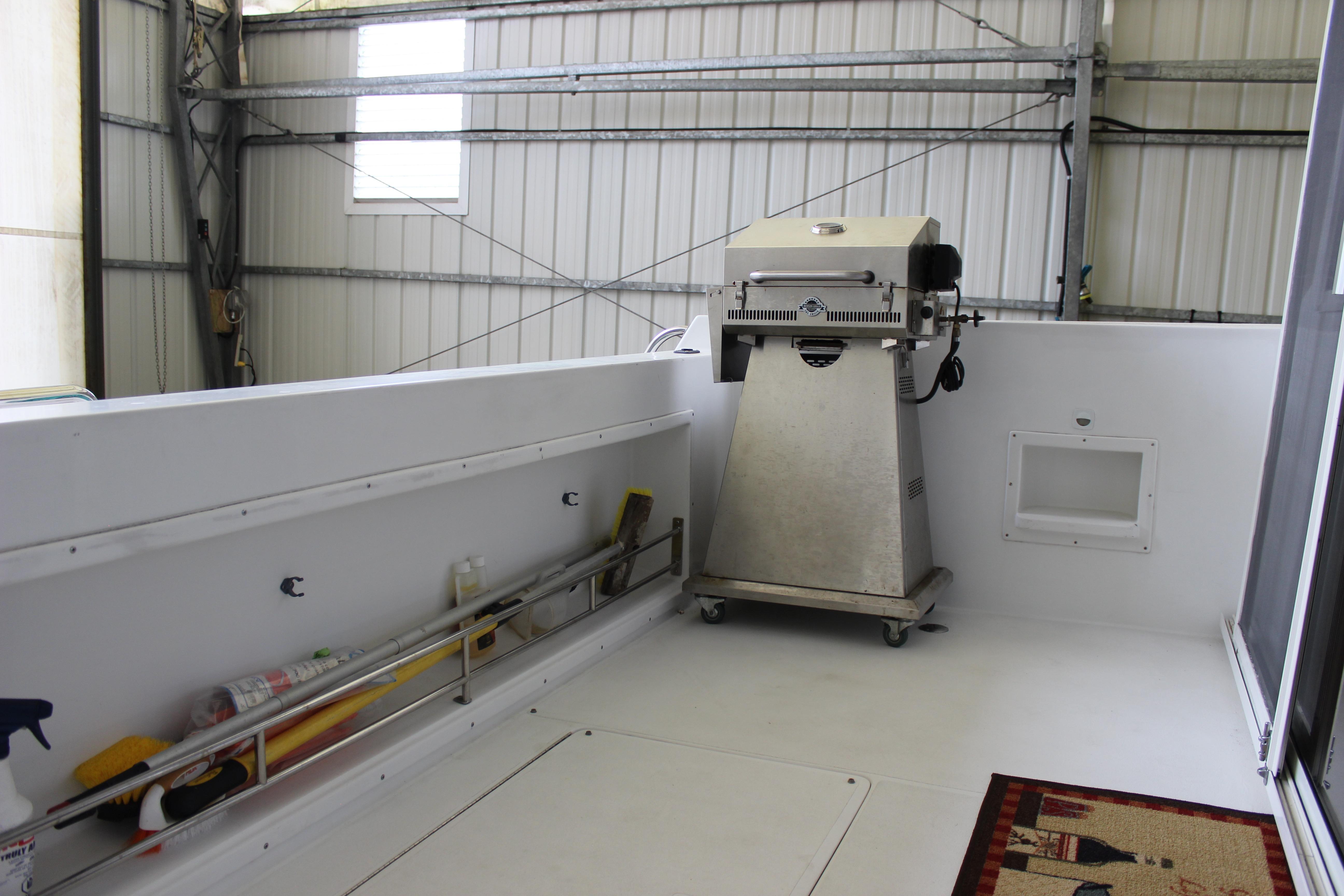 Interior of a 2000 Navigator 4800 yacht with a stainless steel grill.