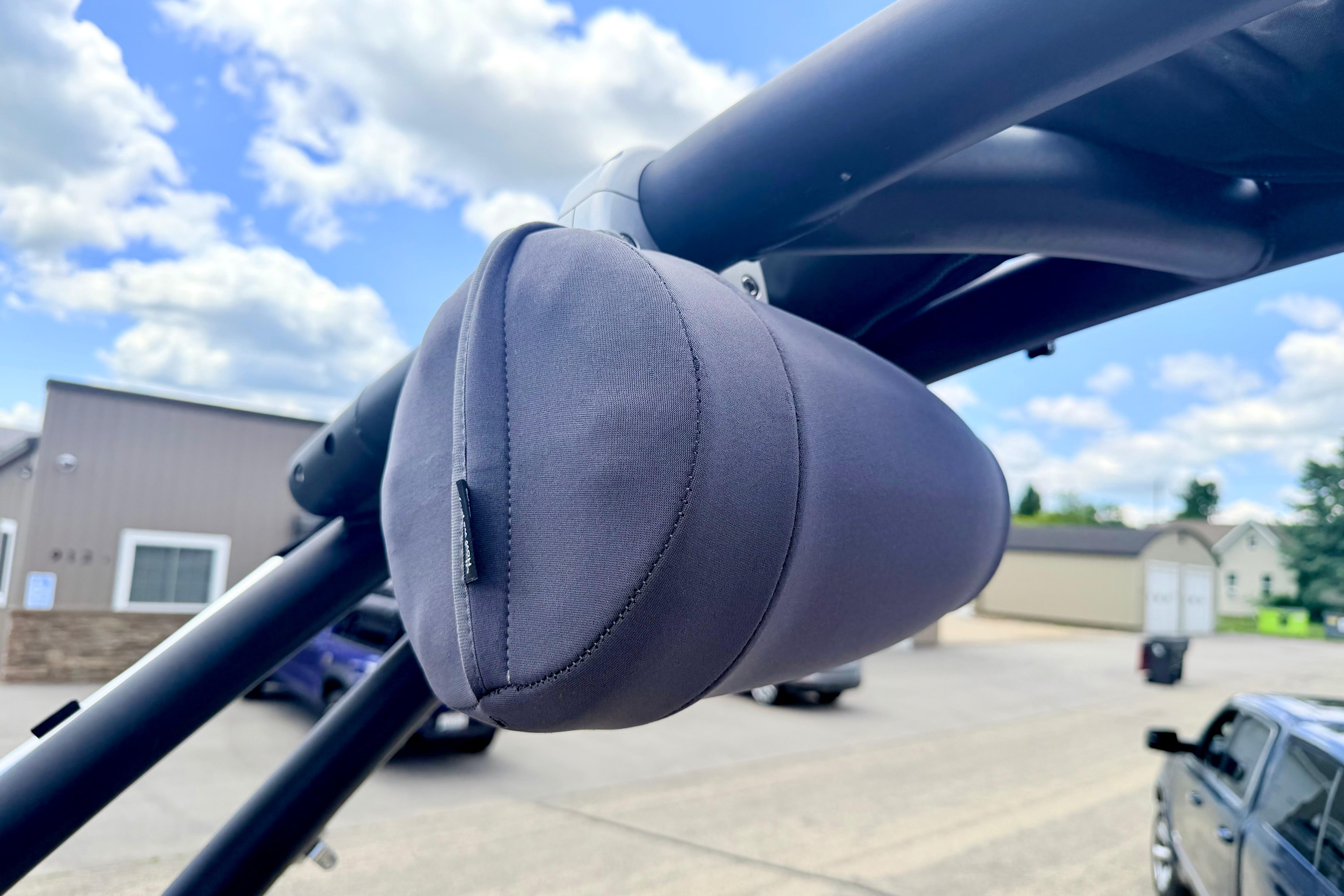 Close-up of a 2018 Glastron GT 185 boat speaker with protective cover.
