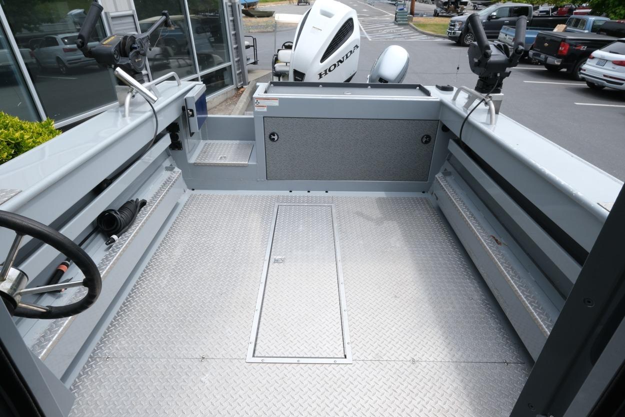 2021 Hewescraft 240 Ocean Pro ET Hardtop boat interior with Honda engine visible.