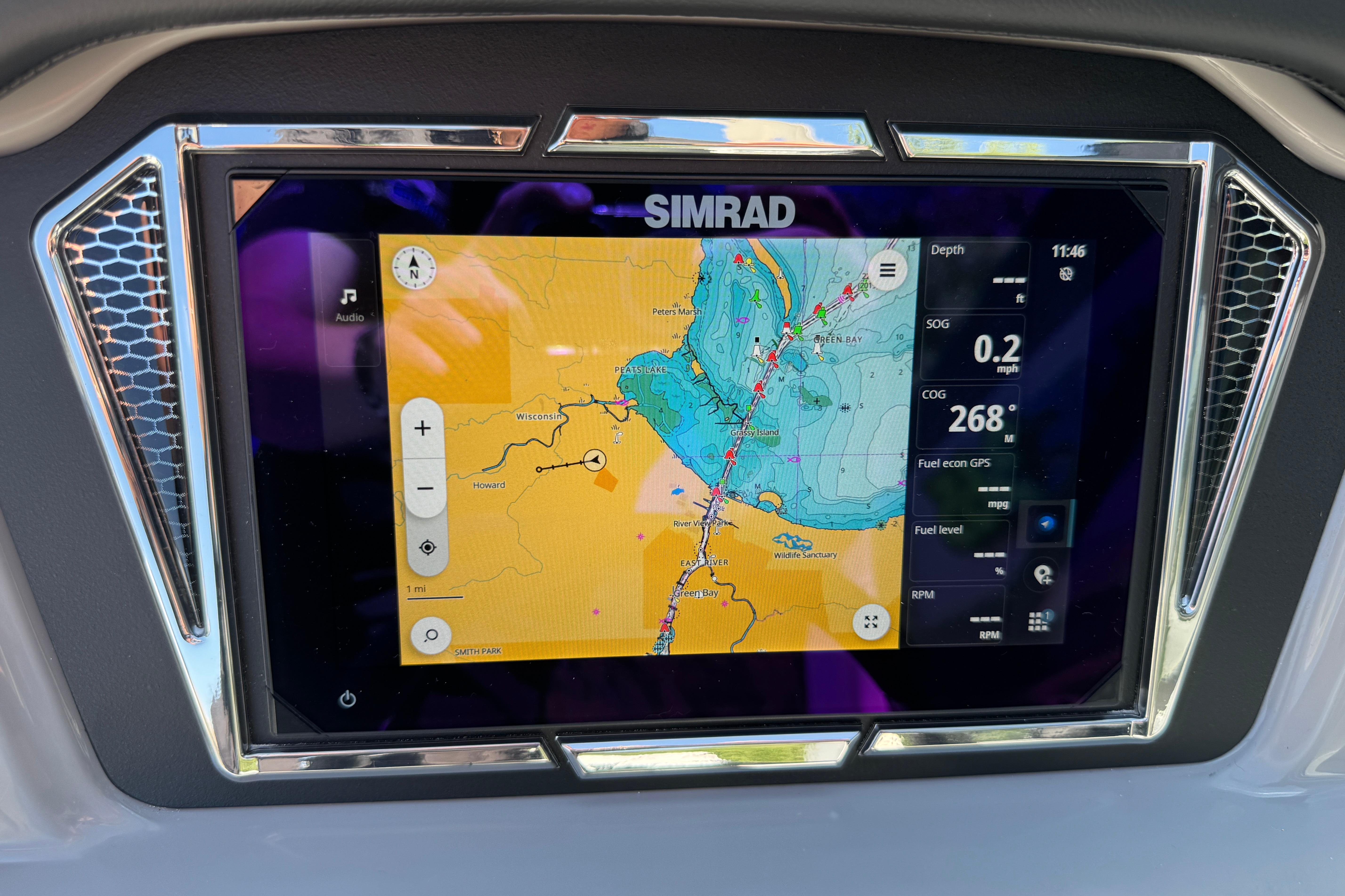 Simrad navigation display on 2026 Chaparral 21 SSi boat, showing detailed marine map.