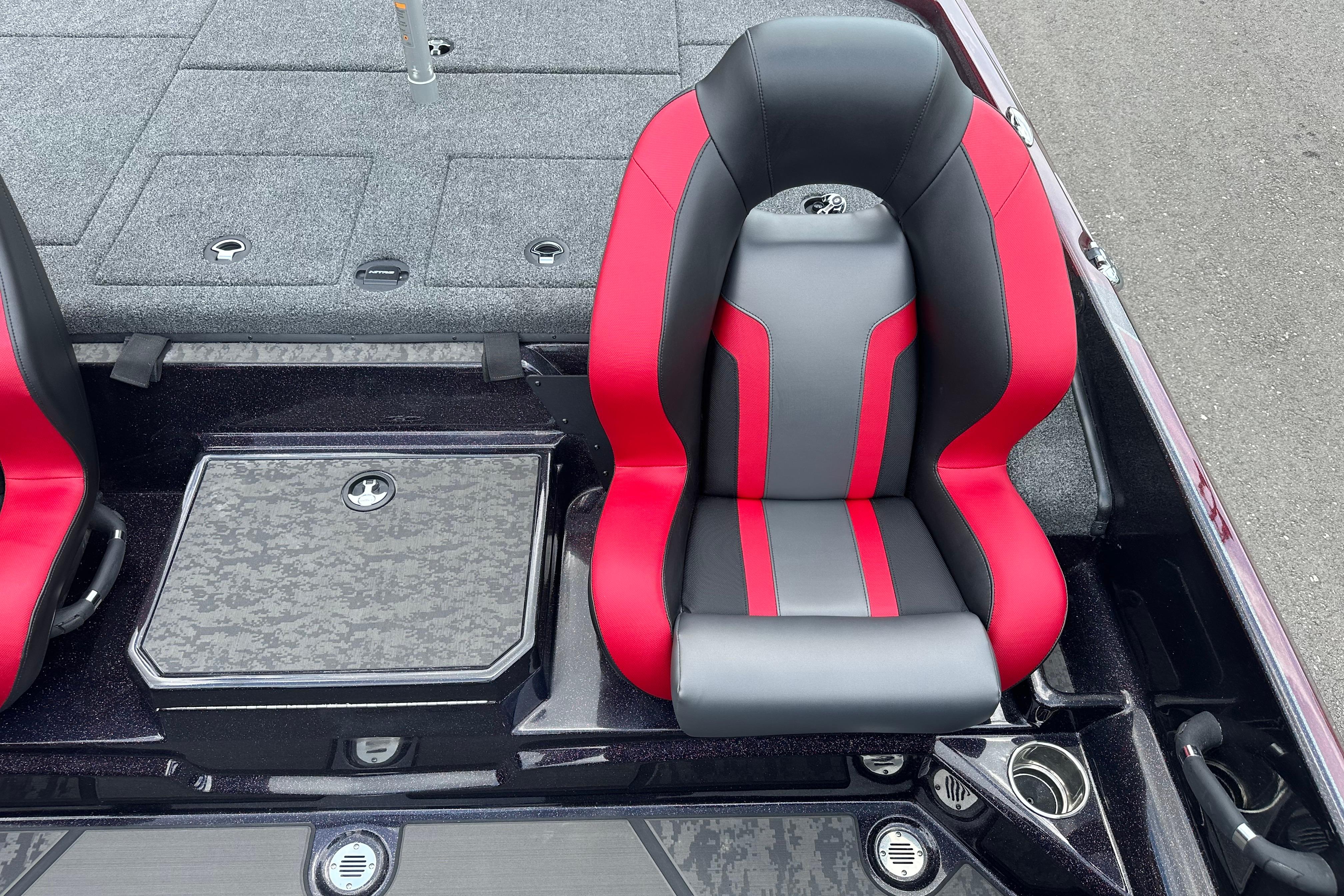 2026 Nitro Z21 XL boat interior with red and gray seating and storage compartments.