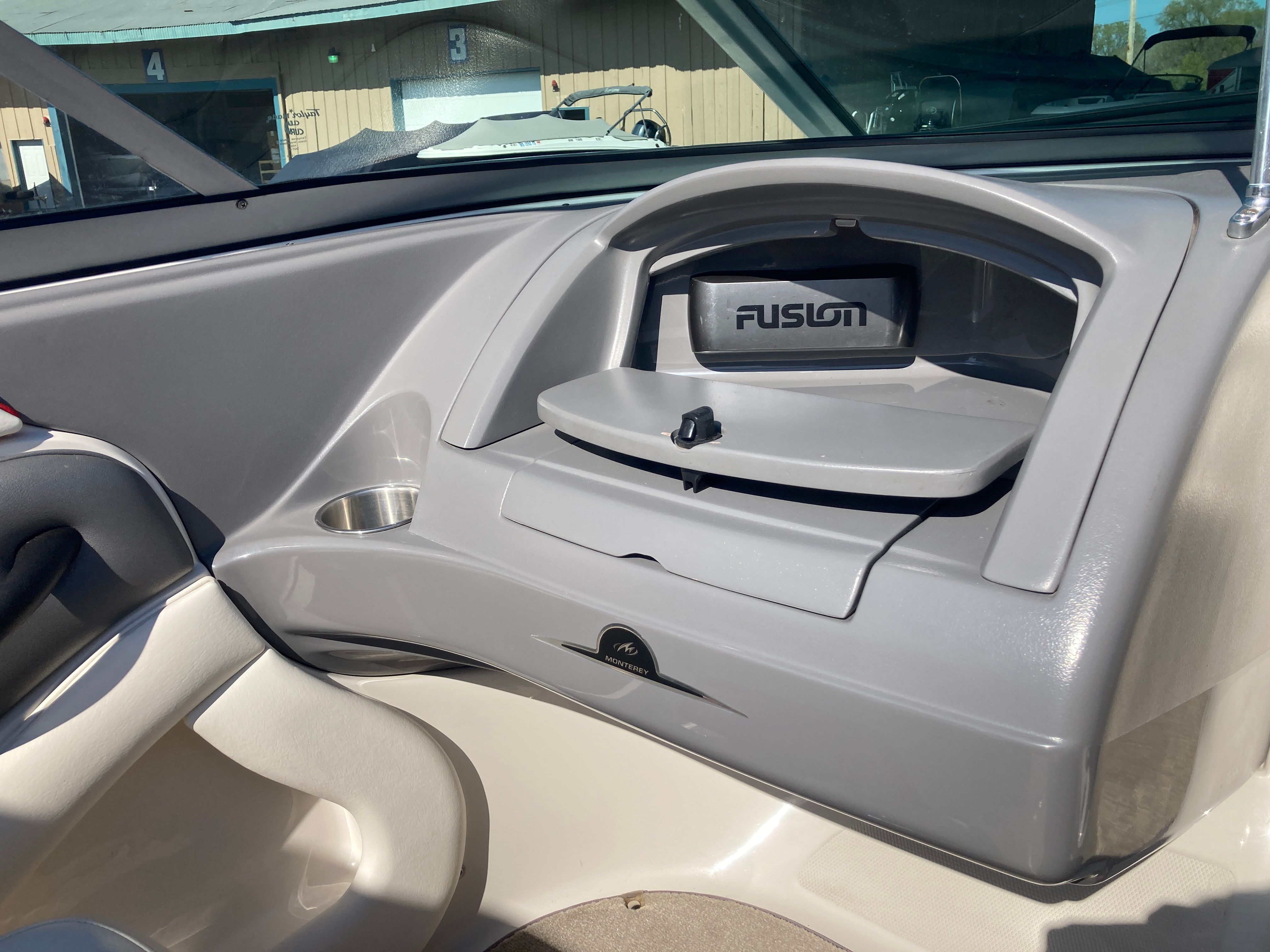Interior of a 2012 Monterey 204FS boat with Fusion audio system.