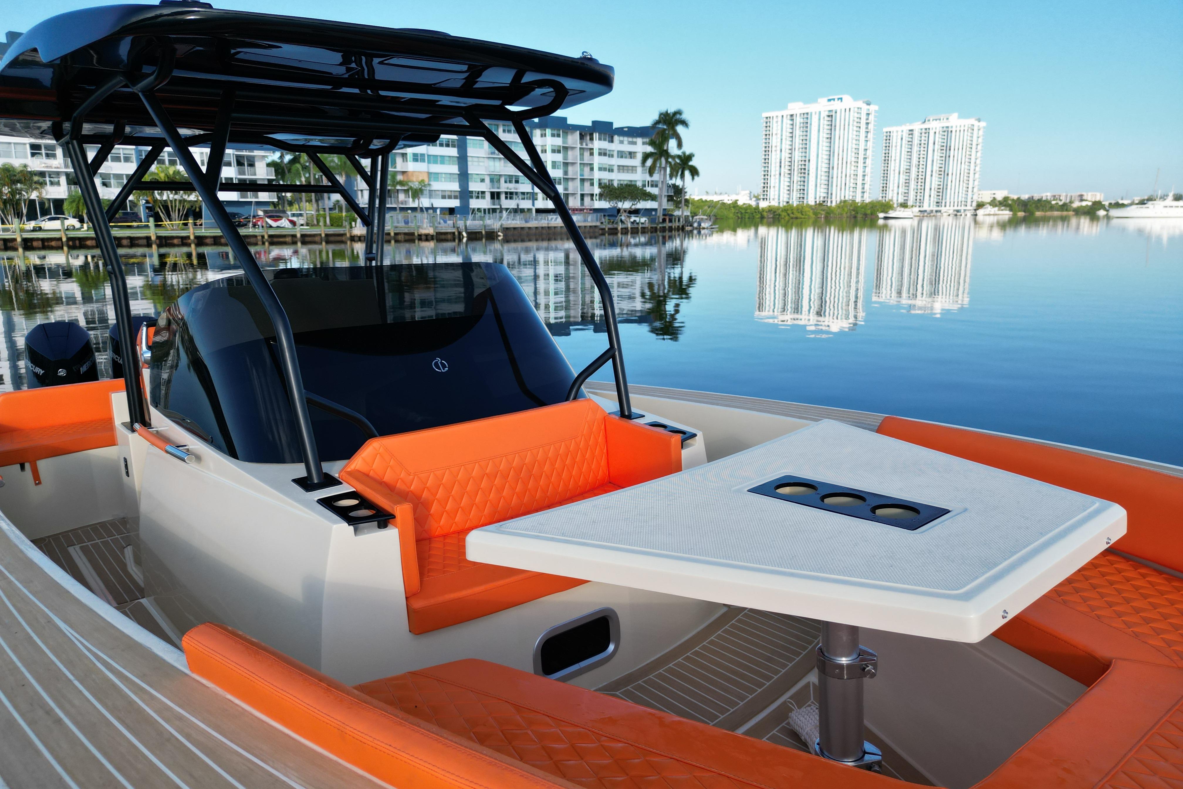 2026 Lilybaeum Lipari 31 boat with orange seating, modern design, and waterfront view.