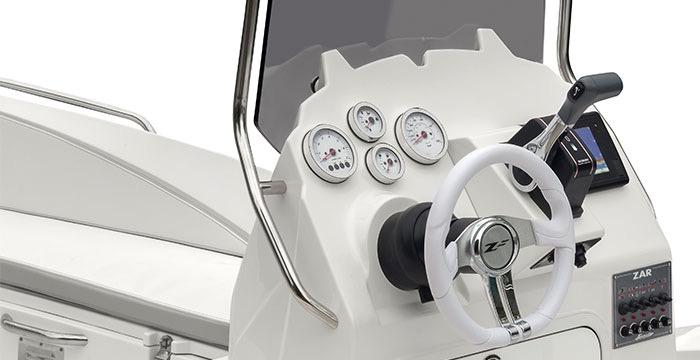 2024 Zar Formenti 49 SL boat dashboard with steering wheel and gauges.