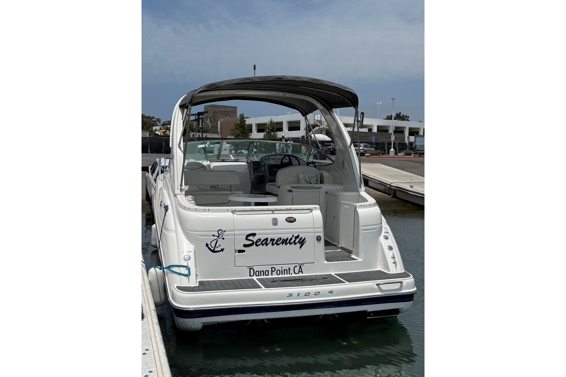 2004 Maxum 3100 SE boat docked at Dana Point, CA marina.