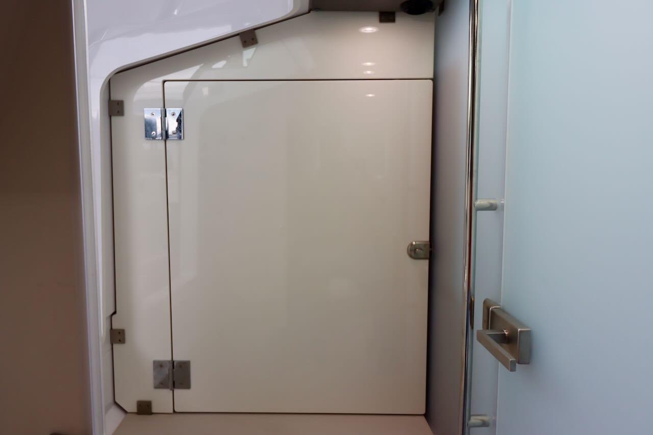 Interior cabin door of 2022 Axopar 37 XC Cross Cabin boat.