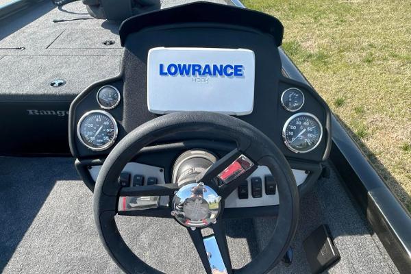 2025 Ranger RT188C boat dashboard with Lowrance display and steering wheel.