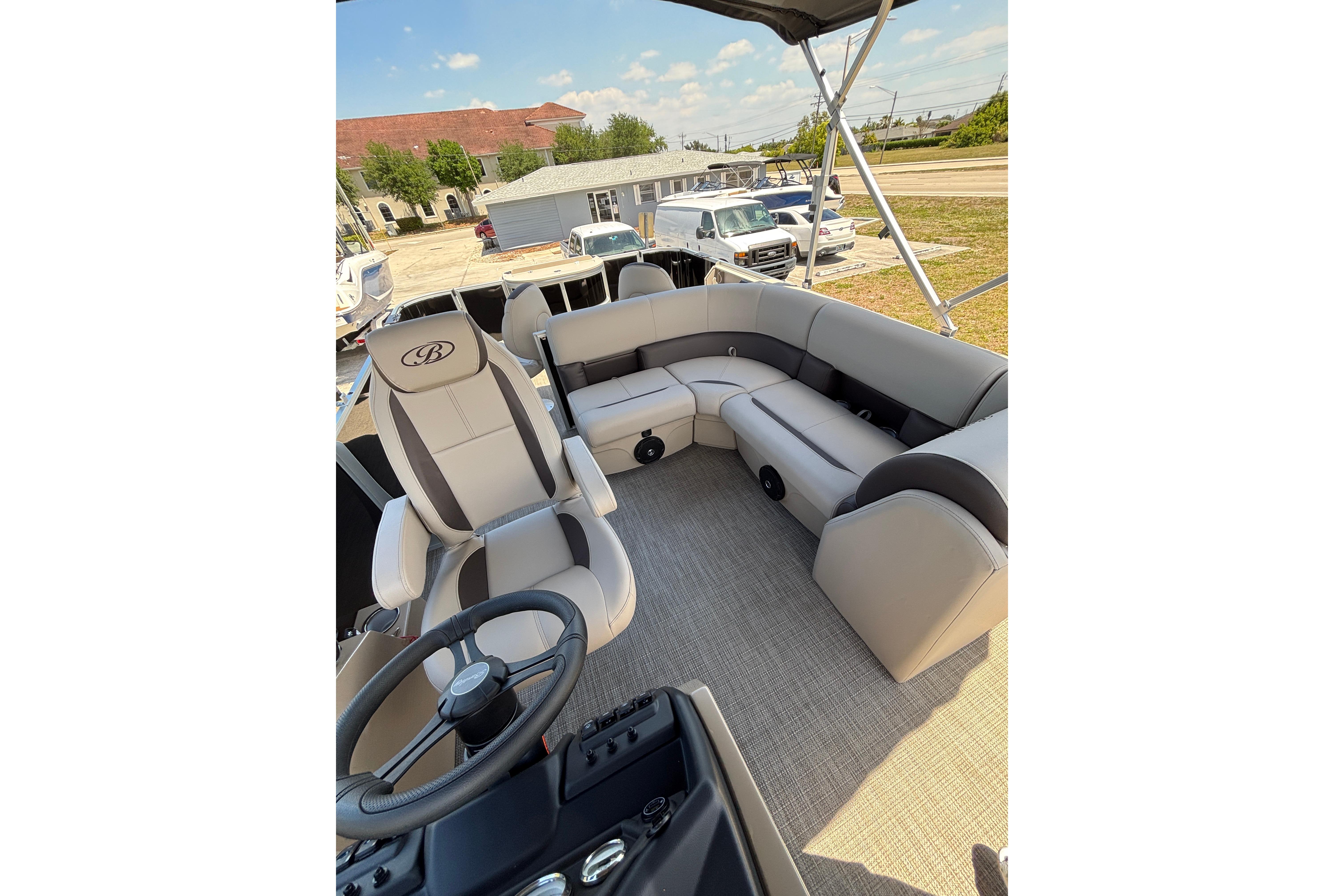 Interior of 2026 Bentley Pontoons Fish 243 4-Point with luxurious seating.