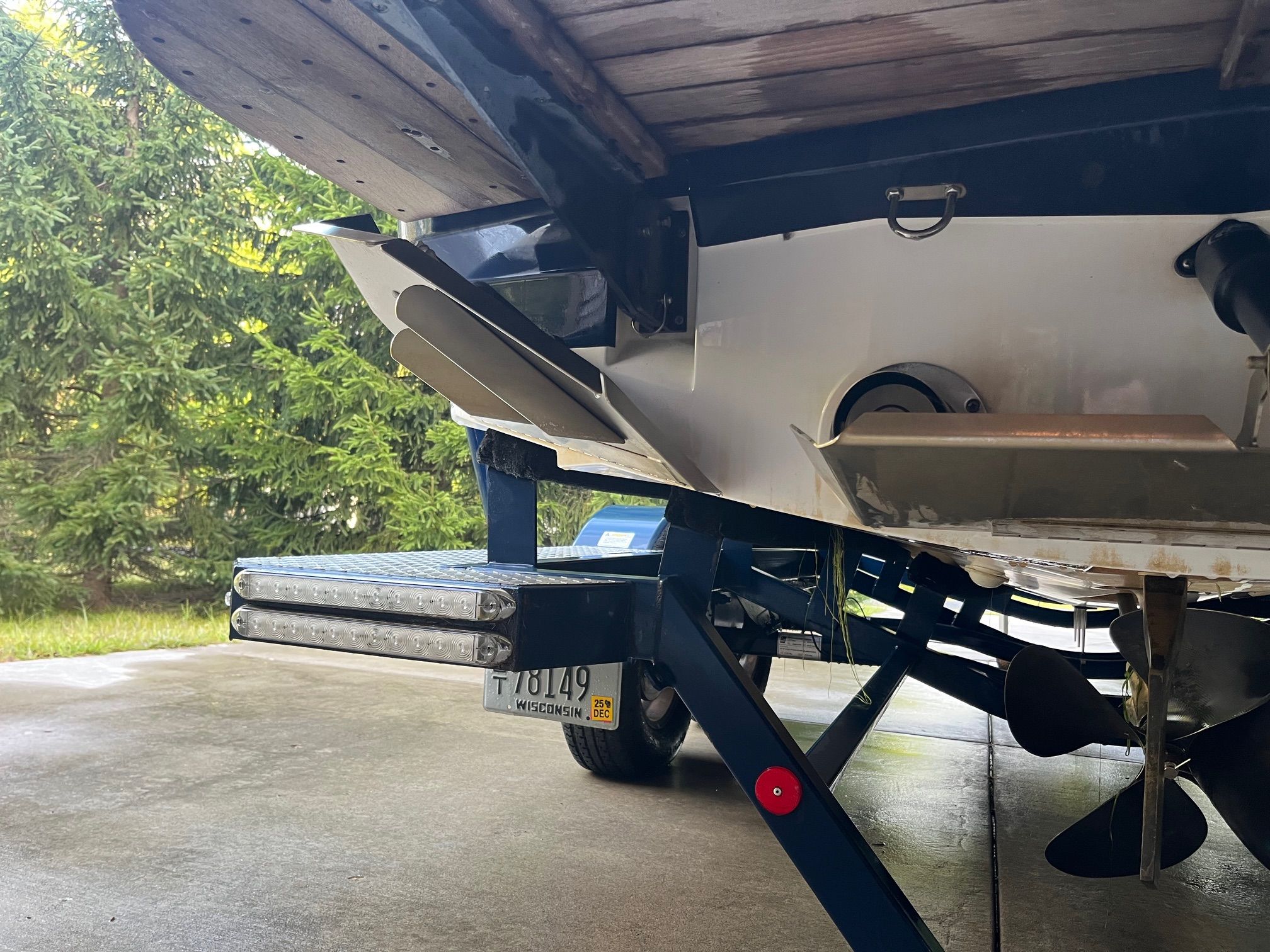 Rear view of a 2015 MasterCraft X20 boat on a trailer.