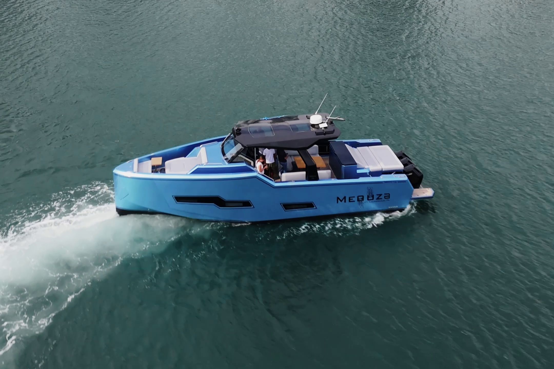 Fabbro F45 Cabrio Outboard 2025 in bright blue on calm water. Modern design with spacious deck.