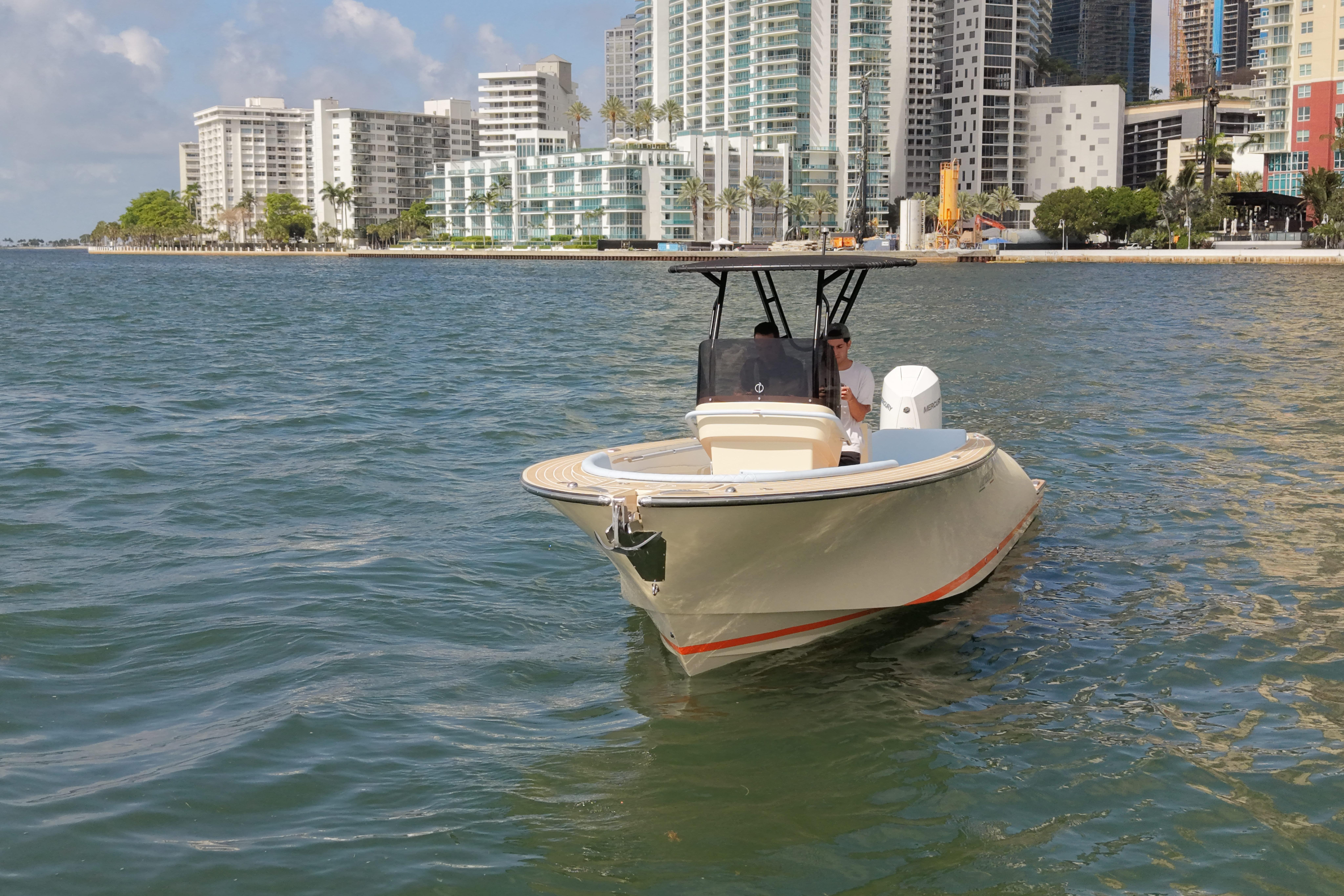 Lilybaeum Levanzo 25 boat cruising near urban waterfront, 2026 model.