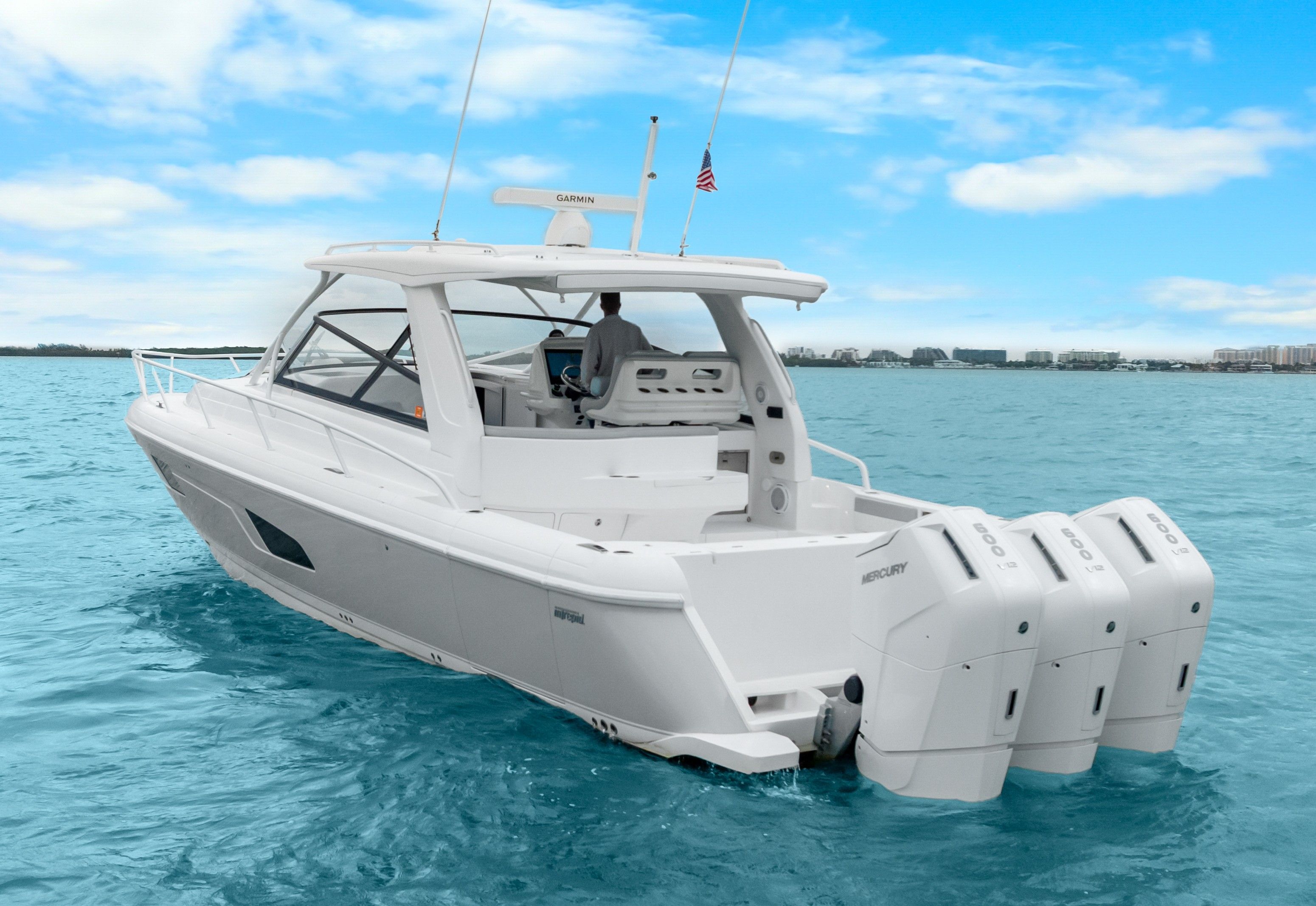 2024 Intrepid 477 Evolution boat on open sea.