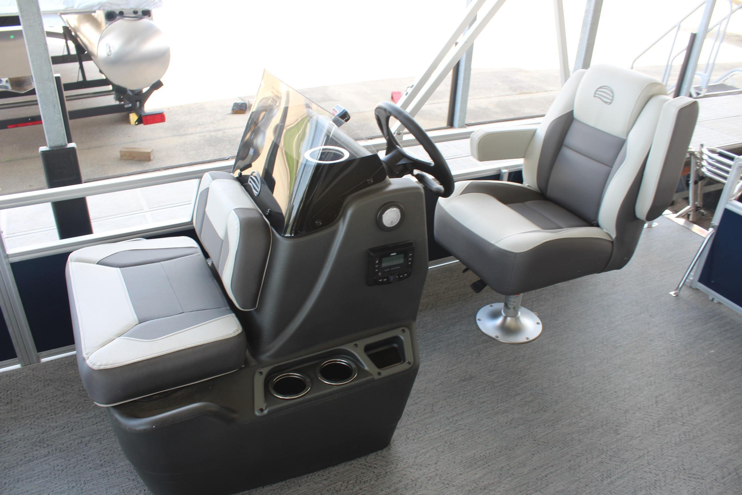 2026 Sun Tracker Bass Buggy 16 XL Select boat interior with steering console and seating.