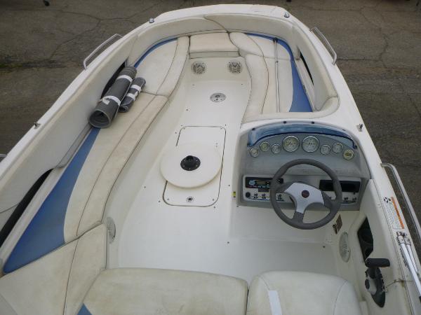 2007 Bayliner 197 Deck Boat interior with steering wheel and seating.