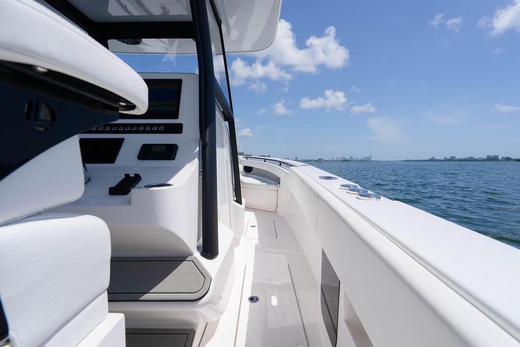 Modern Reef Runner 340 boat interior with ocean view, 2027 model.