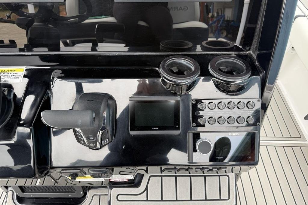 Control panel of 2026 Tidewater 2500 Carolina Bay boat with modern navigation equipment.