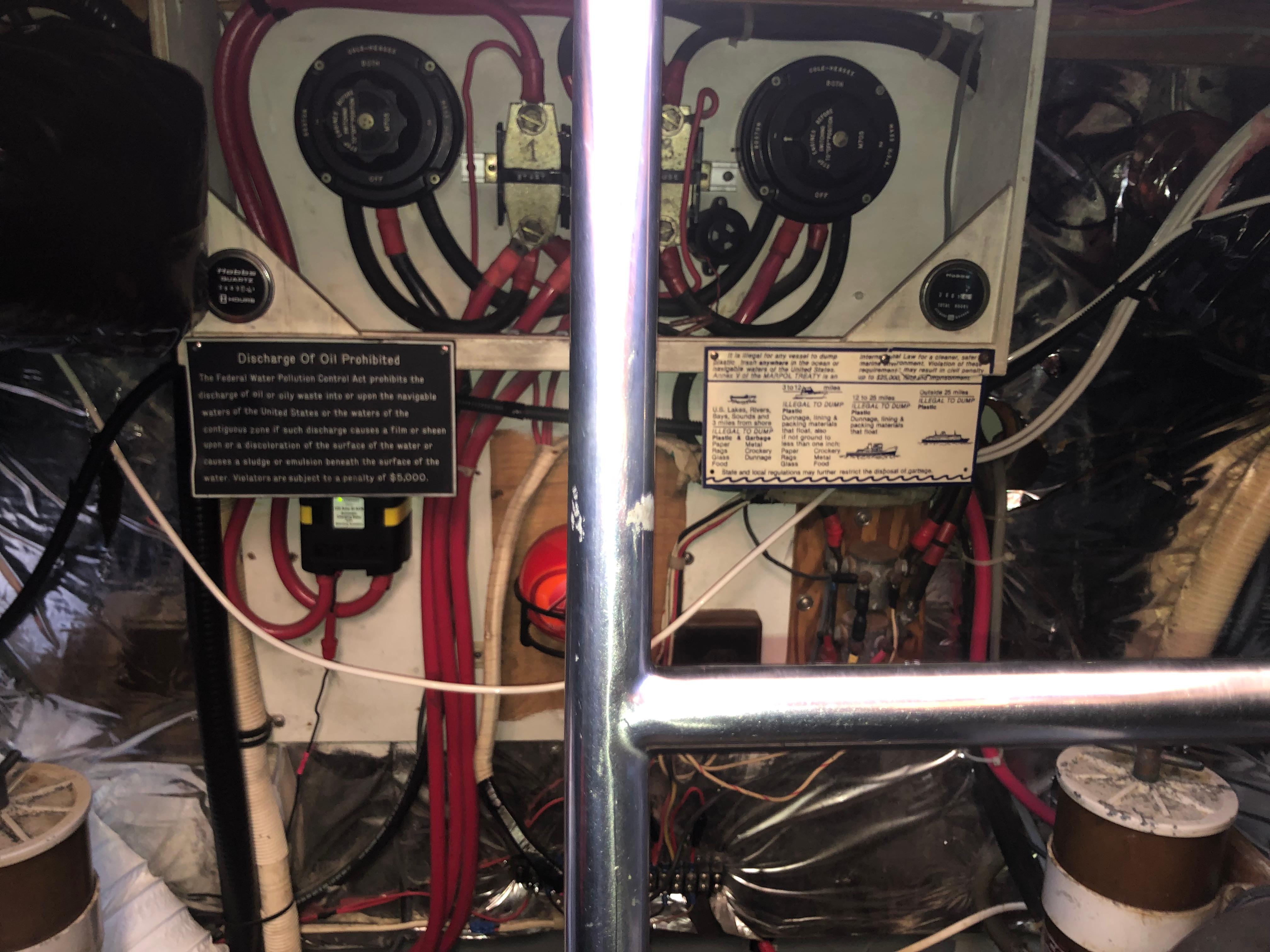 Electrical panel of 1987 Kadey-Krogen Silhouette boat with wiring and labels.