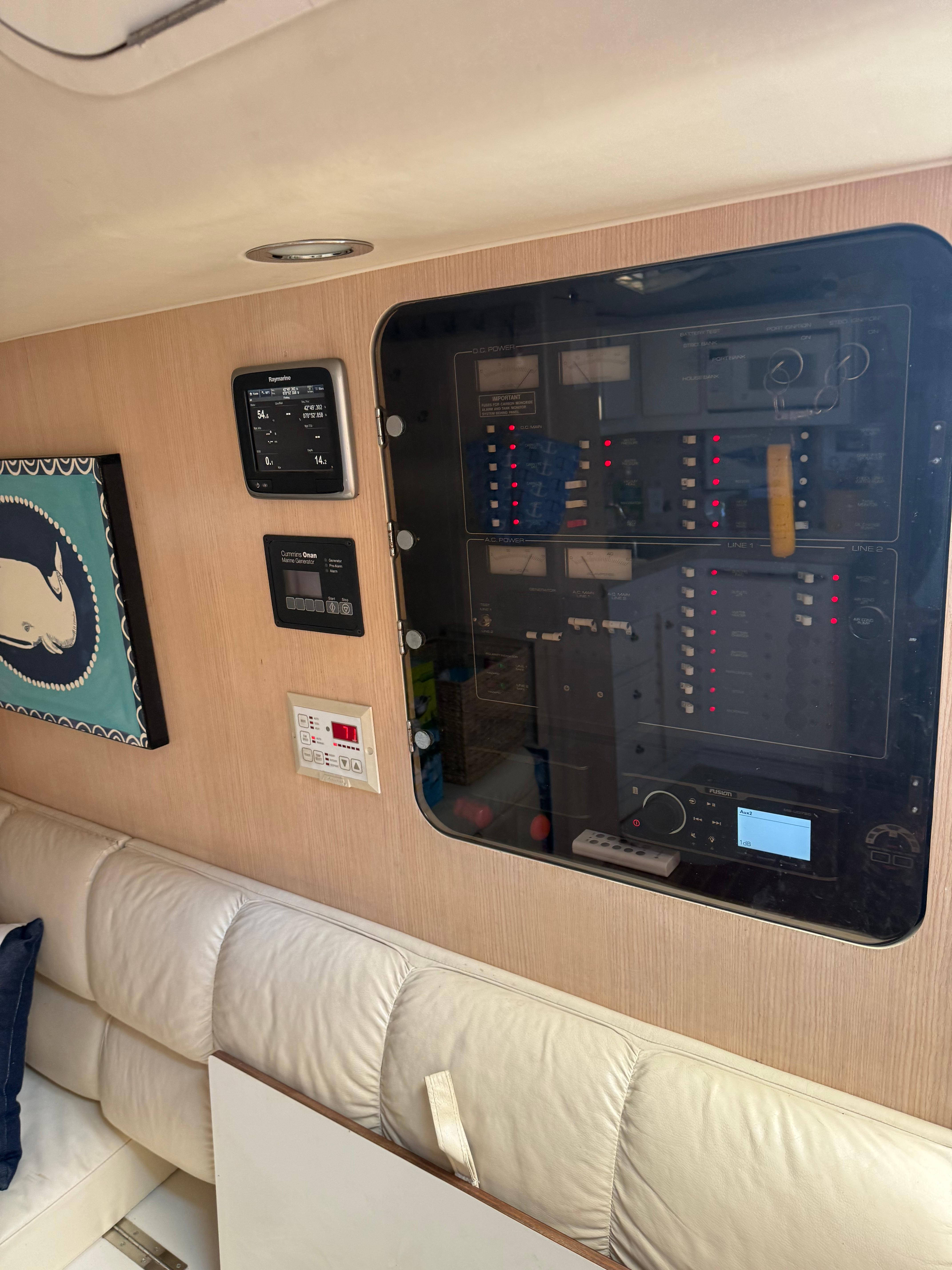 Interior of 1996 Tiara Yachts 3500 Express with control panel.