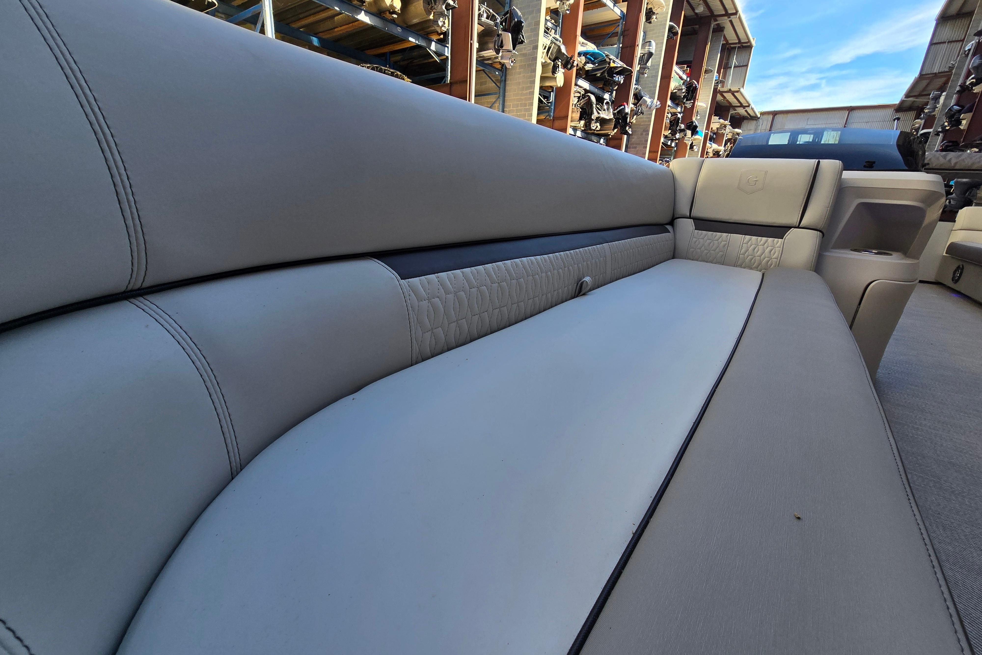 2024 Godfrey Sweetwater 2486 SB boat interior with luxurious seating and modern design.