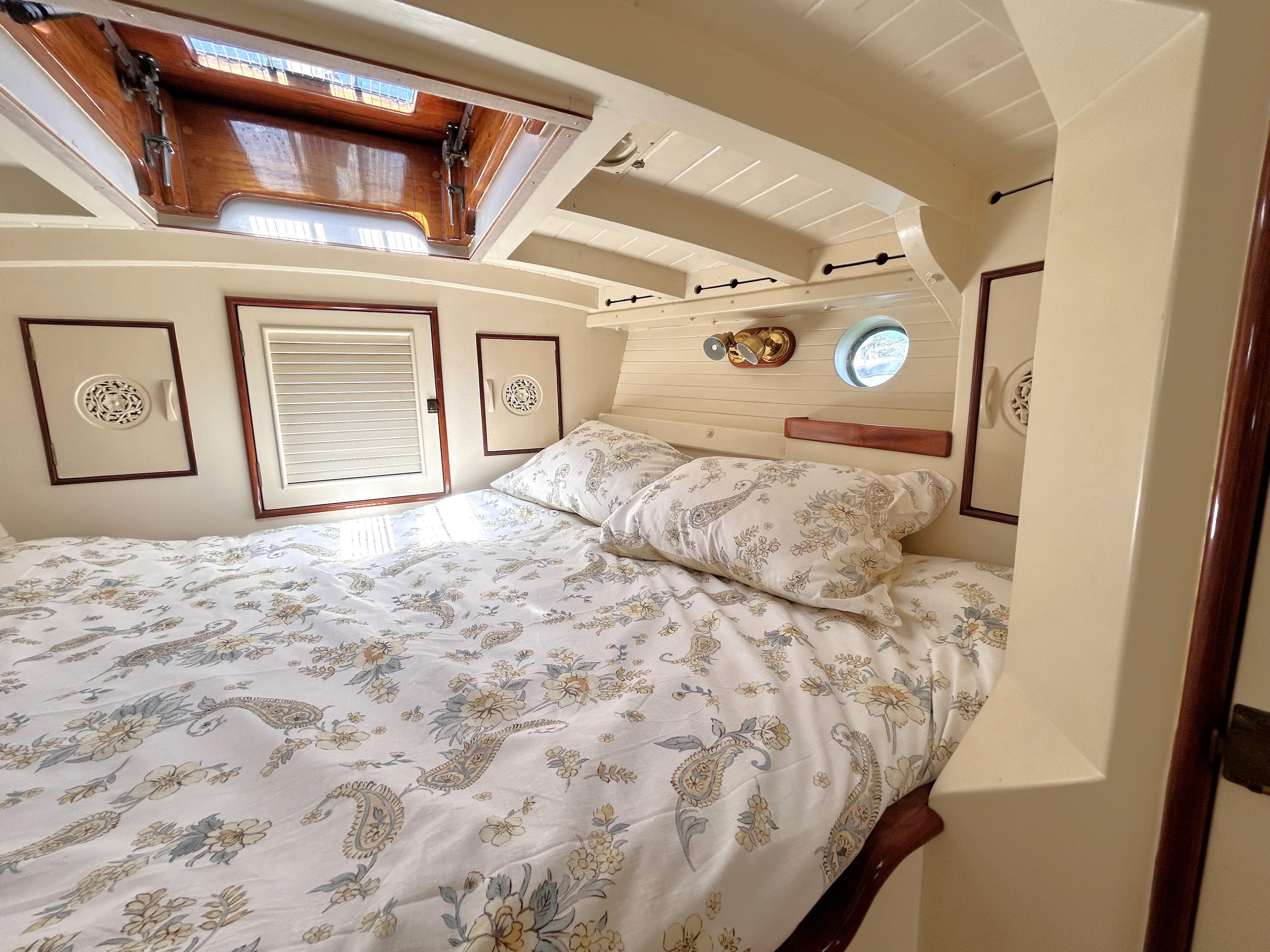 Interior of a 1927 Custom George Wayland 40 yacht, cozy bedroom.