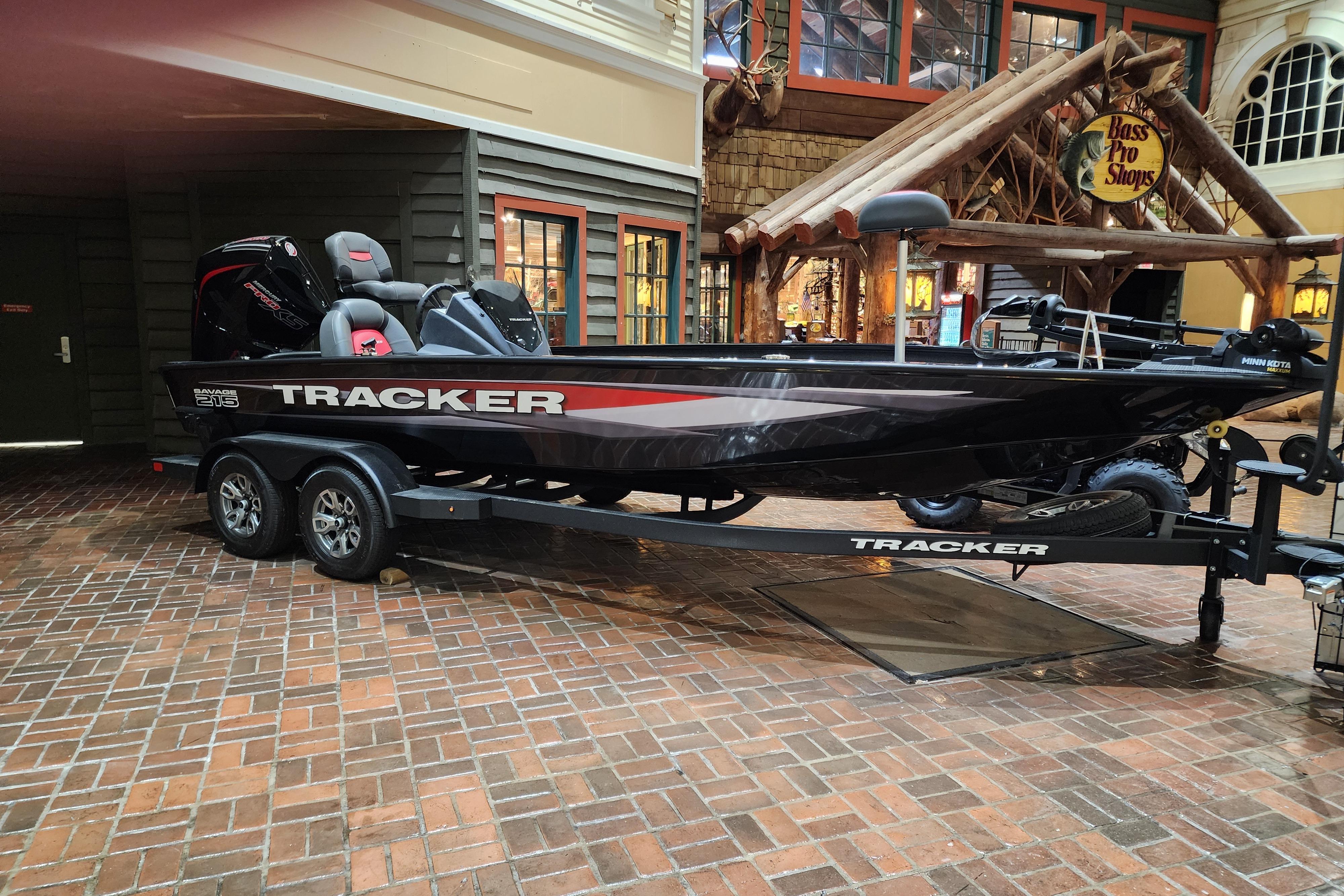 2025 Tracker Savage 215 boat displayed indoors at Bass Pro Shops.