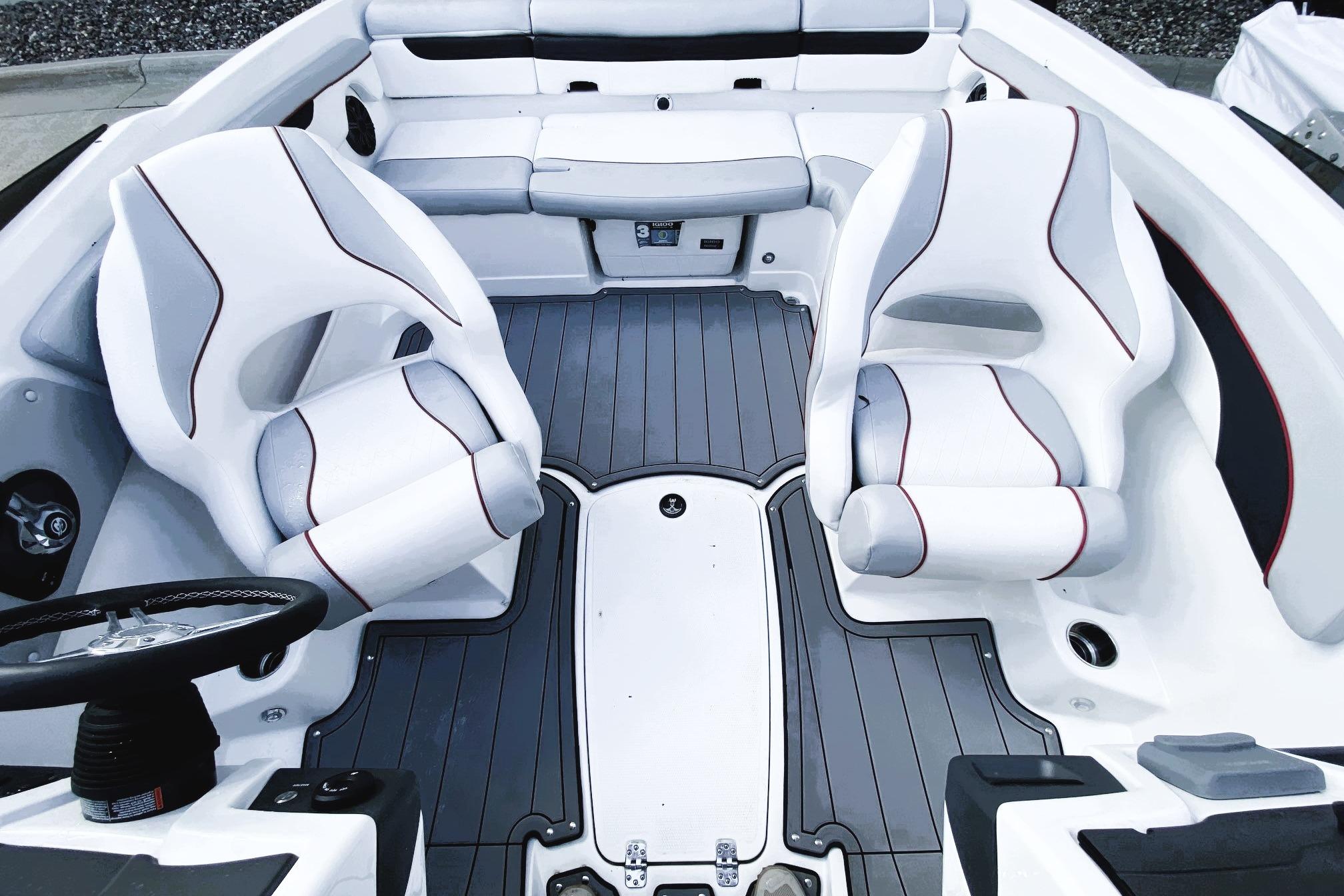 2023 Tahoe 210 Si Limited boat interior with sleek white seating and modern design.