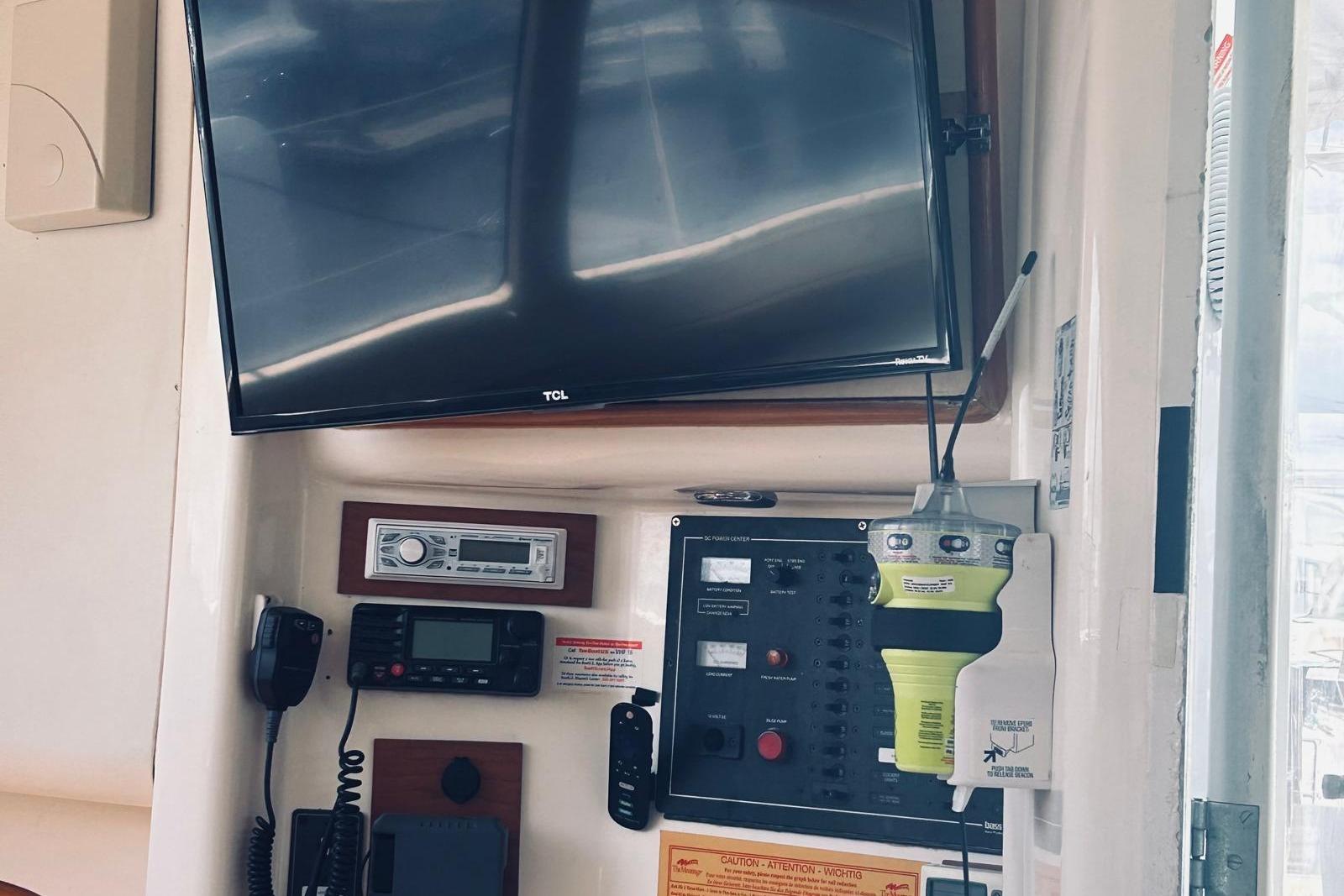 Control panel and electronics on a 2001 Robertson & Caine Leopard yacht.