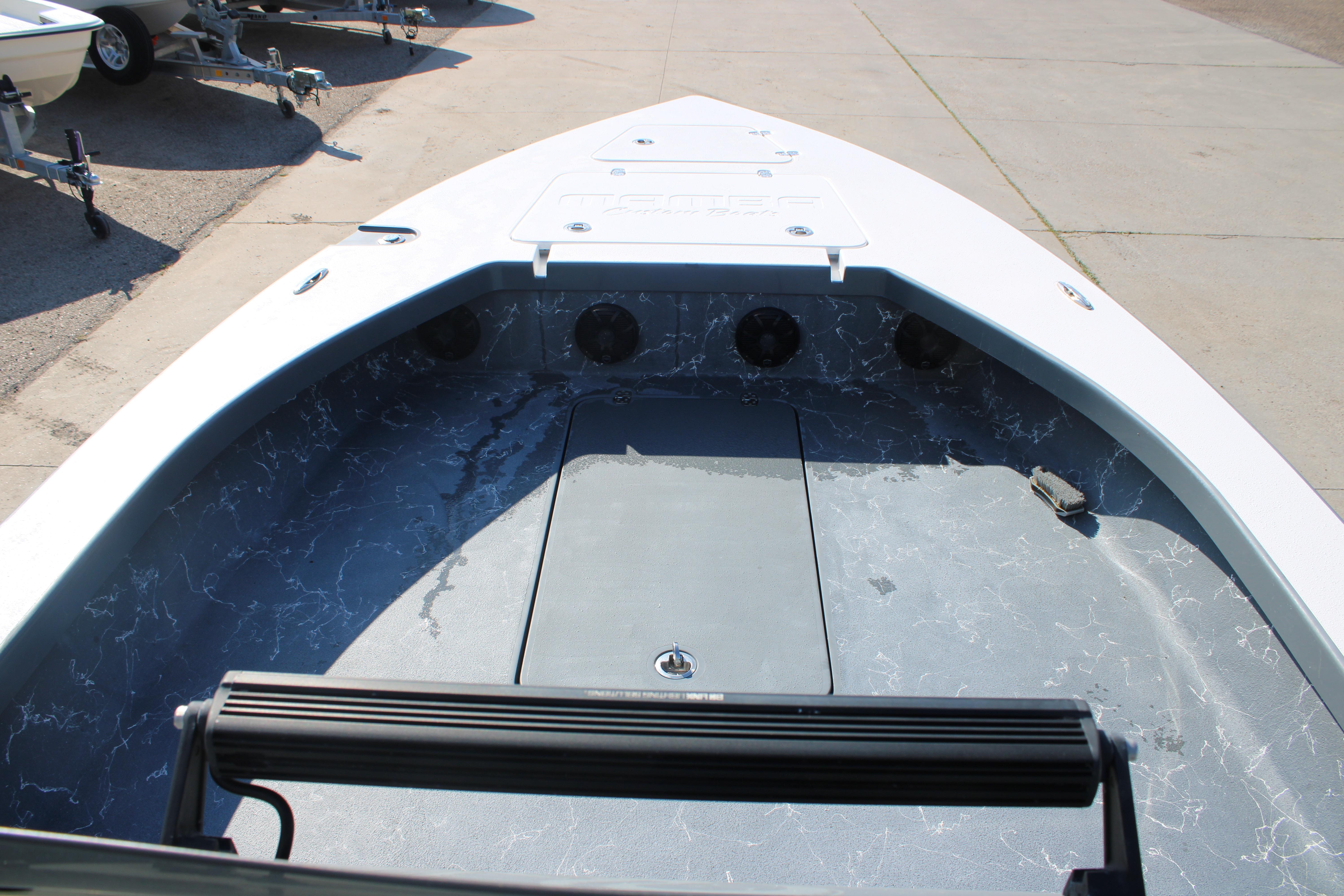 2023 Mamba 24VX boat interior with sleek design and storage compartments.