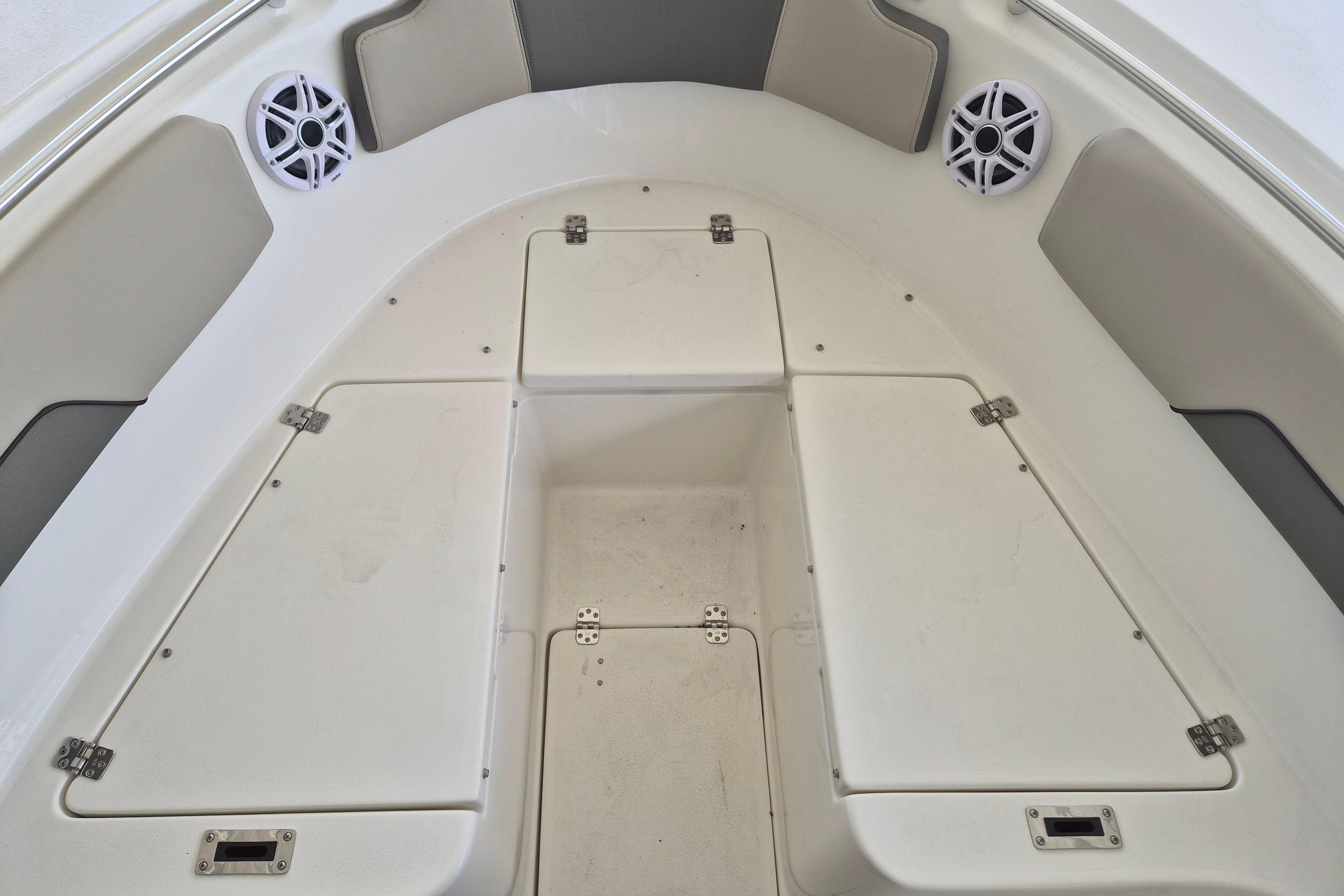 2026 Key West 260 Center Console boat interior with storage compartments and speakers.