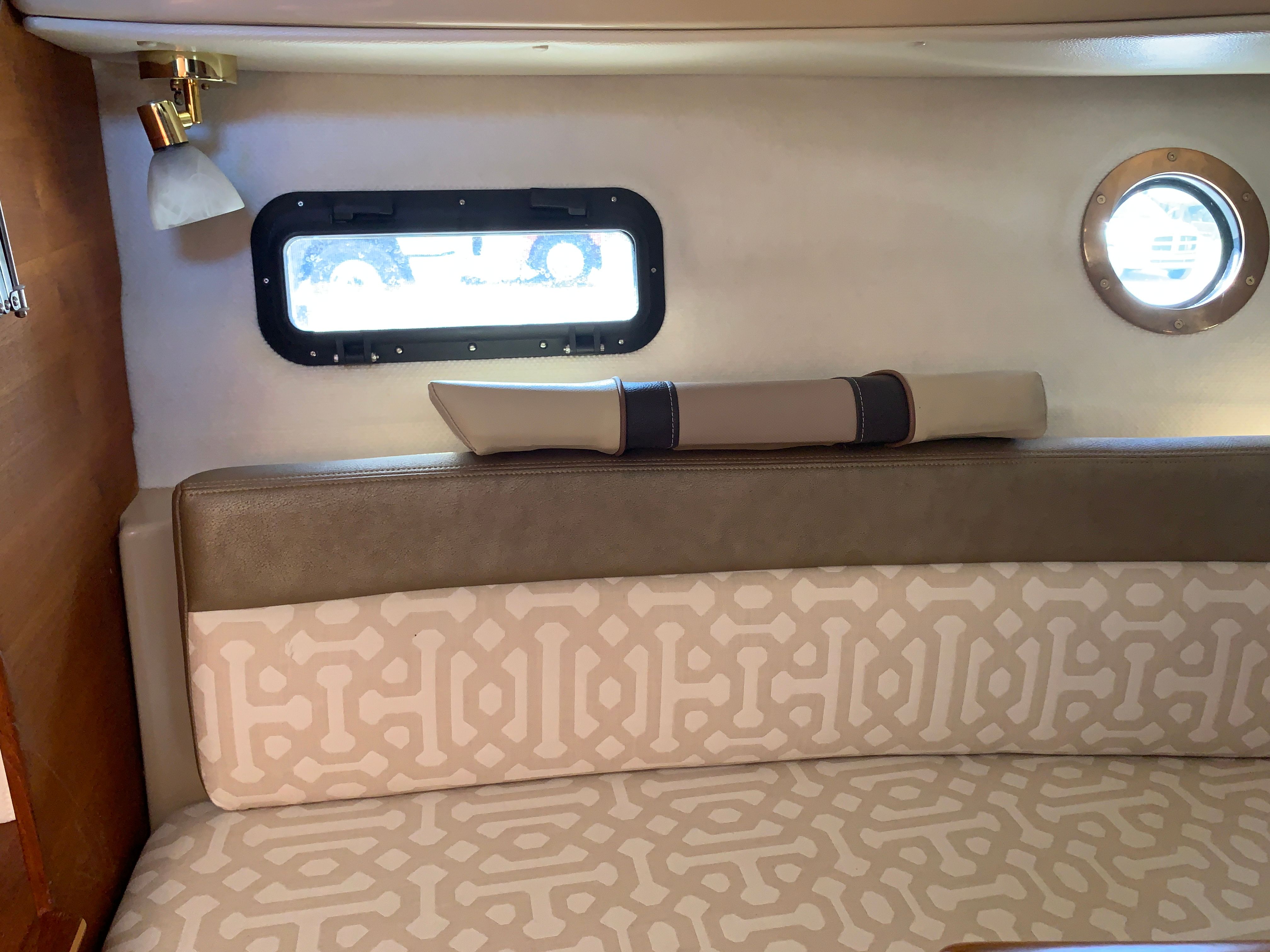 Interior of 2018 Ranger Tugs R-23 boat with cushioned seating.
