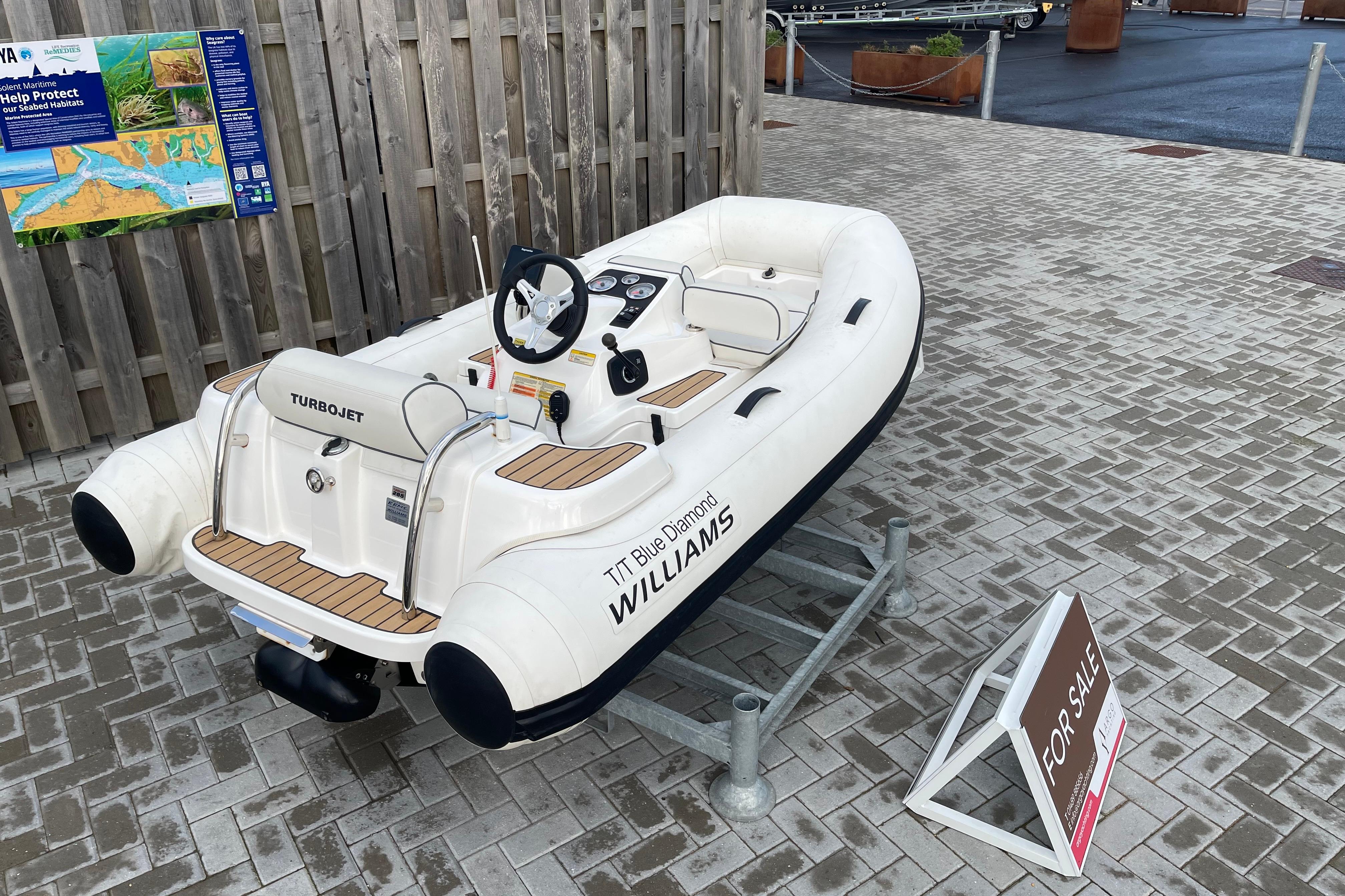 2018 Williams Jet Tenders Turbojet 285 inflatable boat displayed for sale on paved area.
