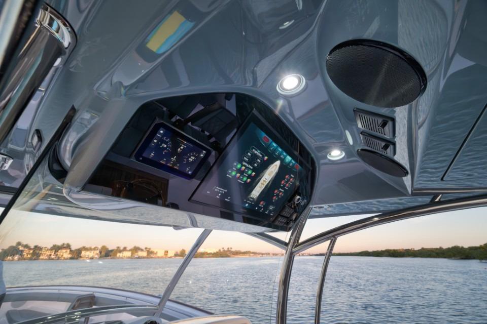 2026 Mag Bay 43 CC boat dashboard with advanced navigation screens and controls.