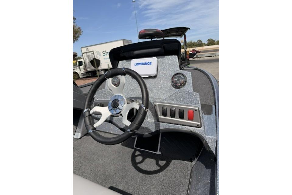 Steering console of a 2026 Nitro Z18 boat with Lowrance display.