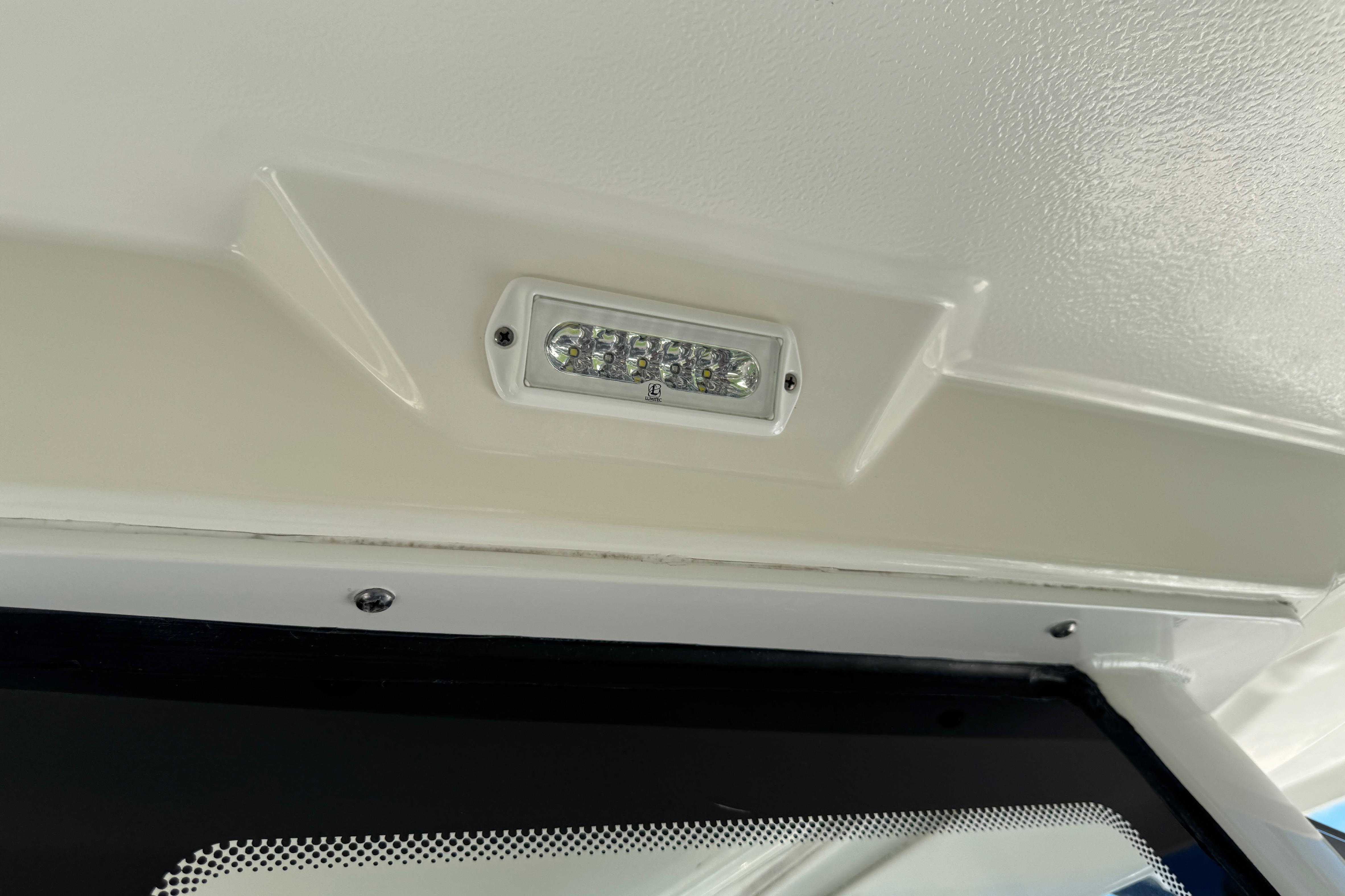 LED light fixture on 2022 Robalo 266 Cayman boat ceiling.